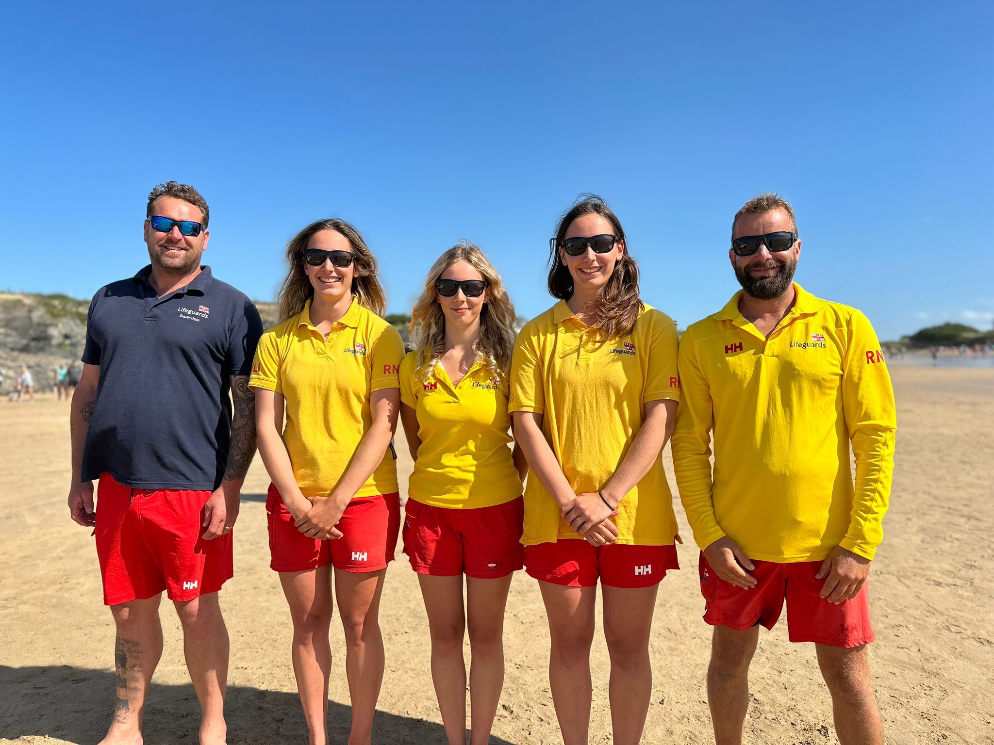 From left to right: Leon Bennett (lifeguard supervisor), Issey, Scarlet, Maisie and Gareth Barnes