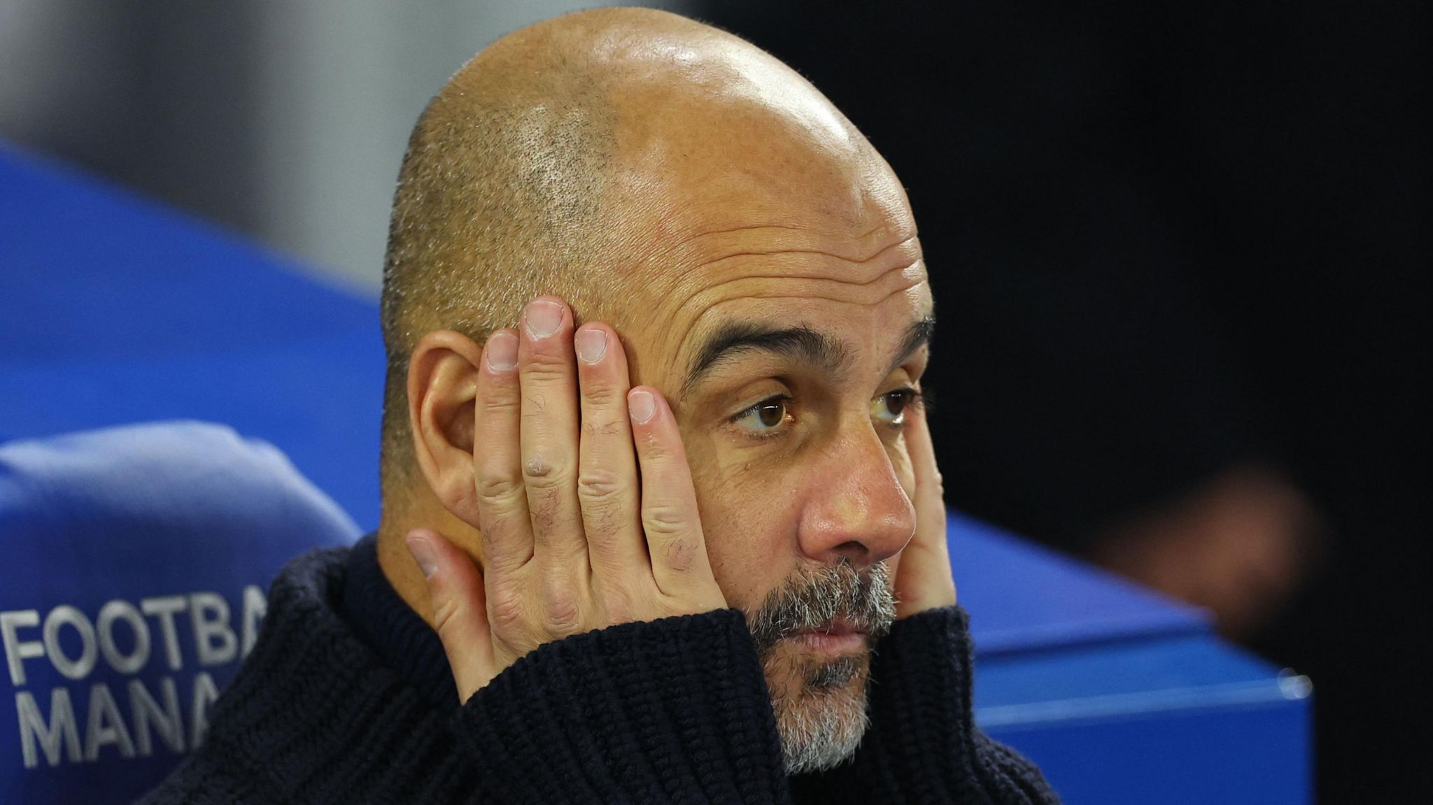 Manchester City manager watches on in despair during the defeat at Brighton