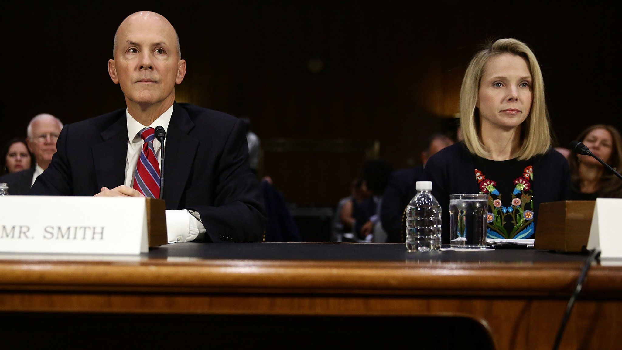 Former CEO of Equifax Richard Smith (L) and former CEO of Yahoo Marissa Mayer (R) wait for the beginning of a hearing before Senate Commerce, Science and Transportation Committee November 8, 2017 on Capitol Hill in Washington, DC