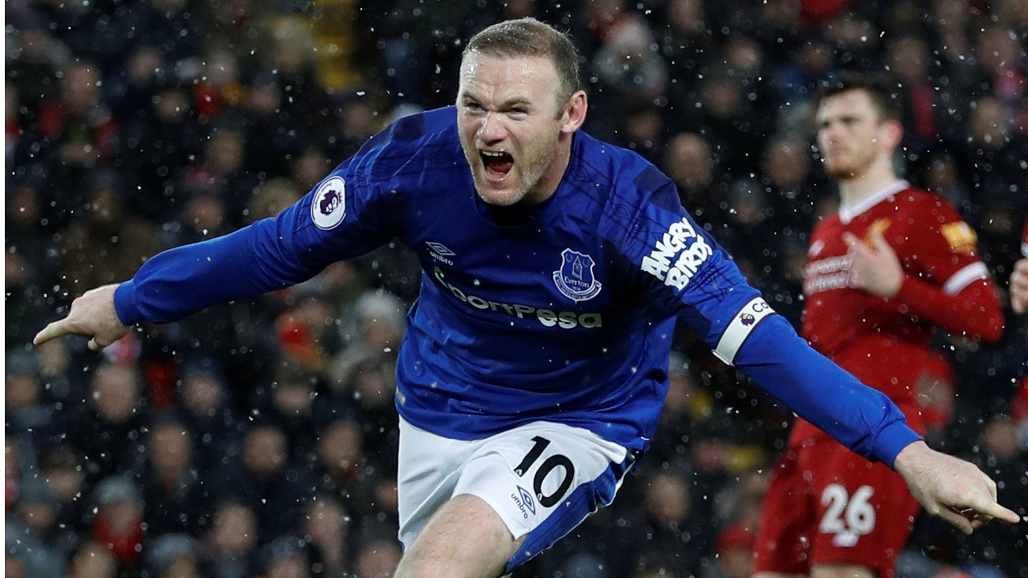 Wayne Rooney celebrates scoring for Everton against Liverpool