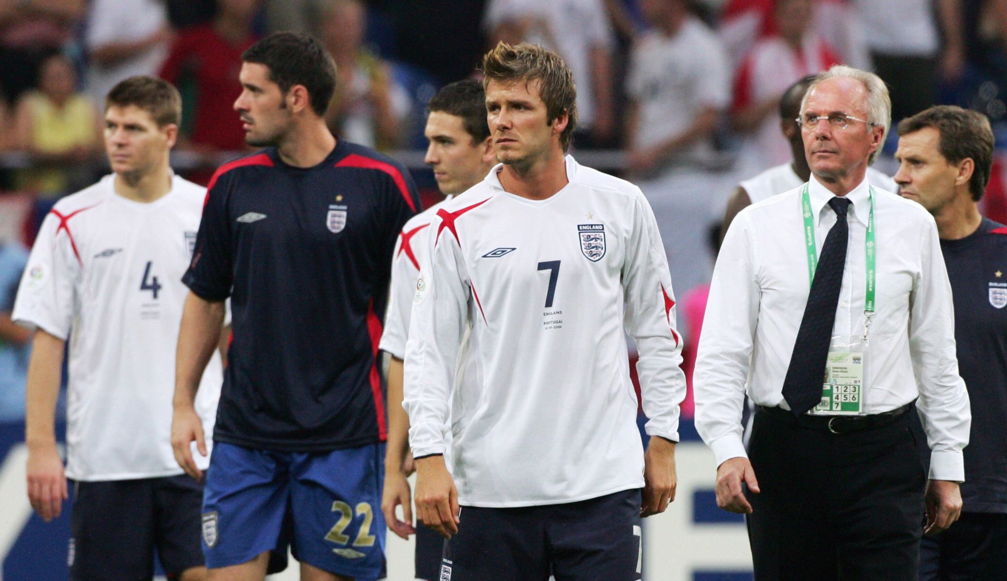 Sven Goran-Eriksson and England's players after defeat by Portugal in 2006