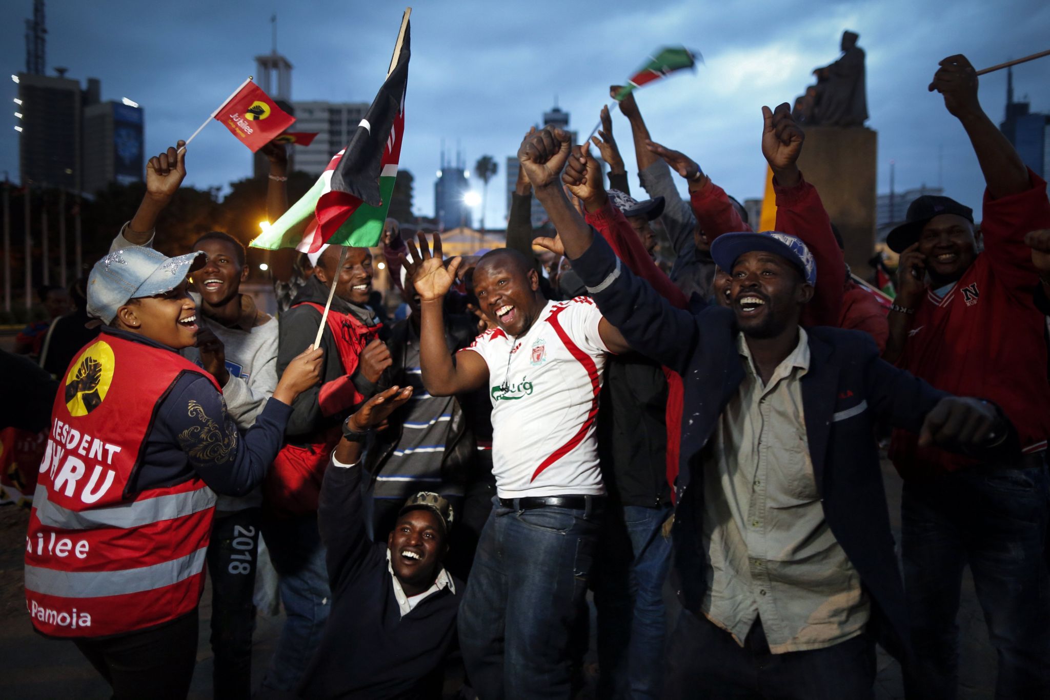 upporters of the incumbent President and the leader of the ruling Jubilee coalition Uhuru Kenyatta cheer as they wait for the electoral body to announce Kenyatta"s victory, in downtown Nairobi, Kenya, 11 August 2017. The electoral body Independent Electoral and Boundaries Commission (IEBC) is expected to announce the winner of the presidential poll soon where Kenyatta will beat opposition Raila Odinga by a big margin.