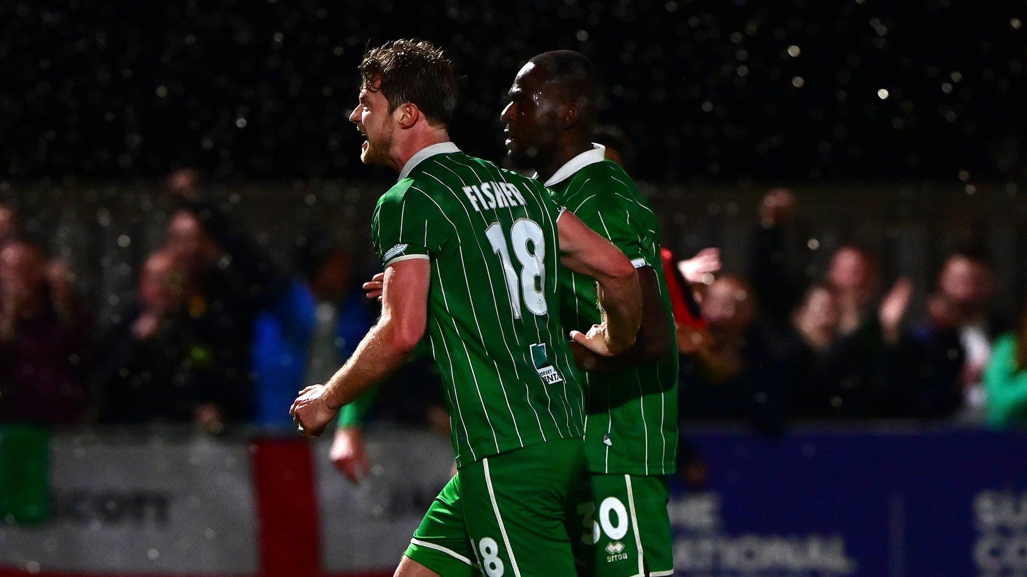 Alex Fisher celebrates his goal