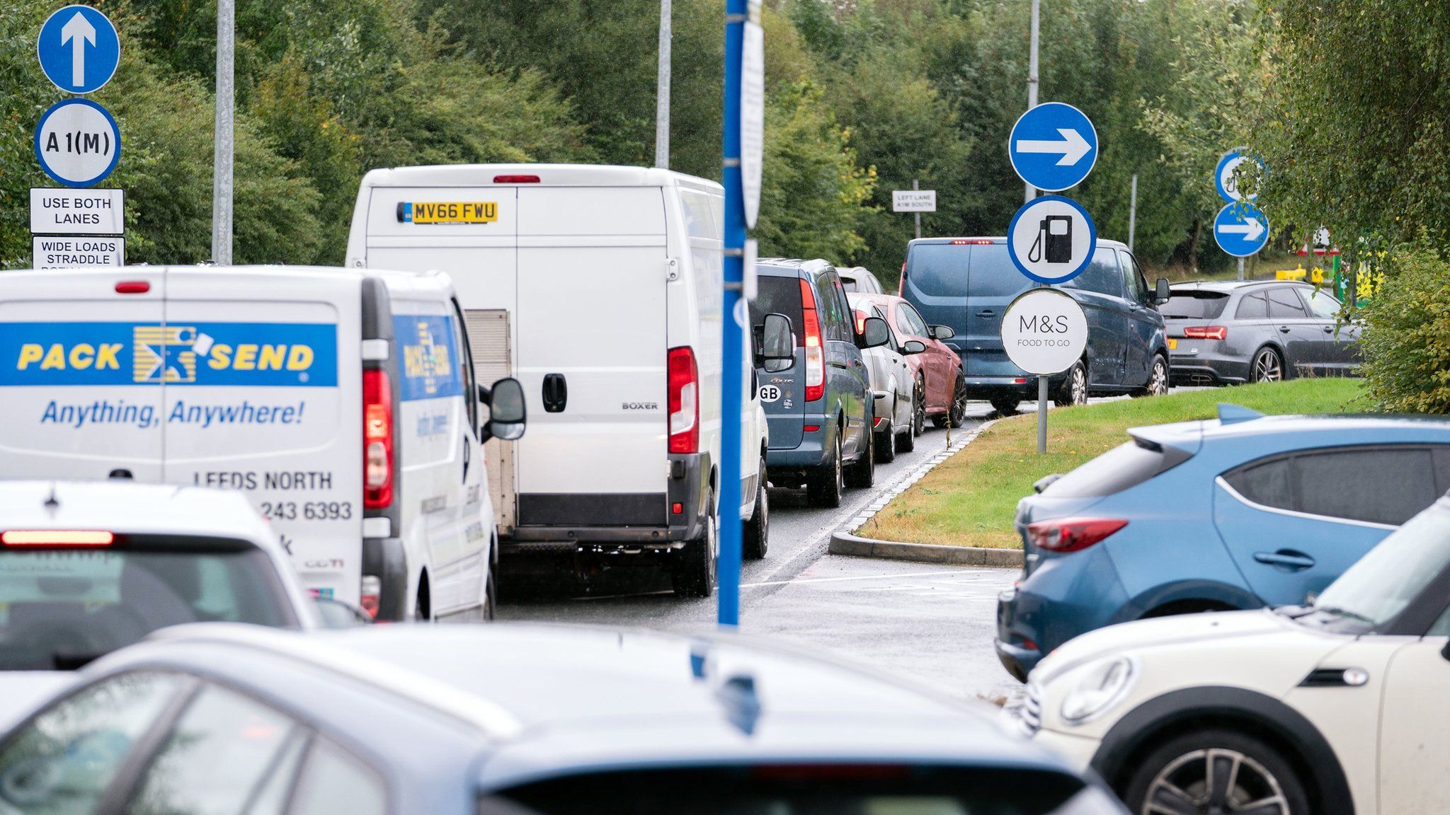 Cars queuing at a BP service station at Wetherby Services near Leeds