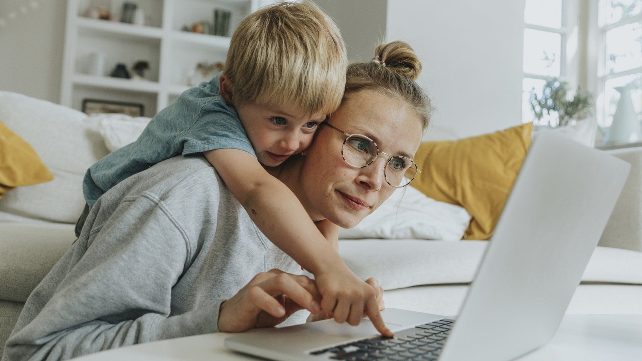 Woman and child working from home
