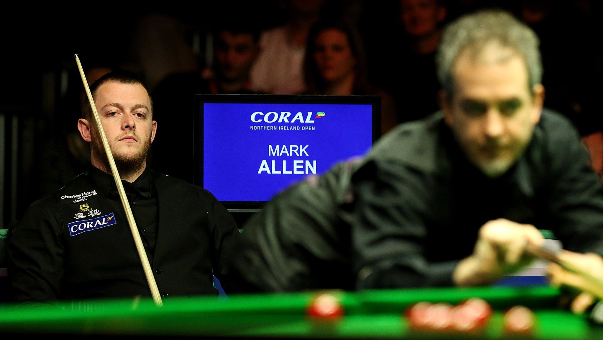 Mark Allen can only watch on as Anthony Hamilton plays a shot