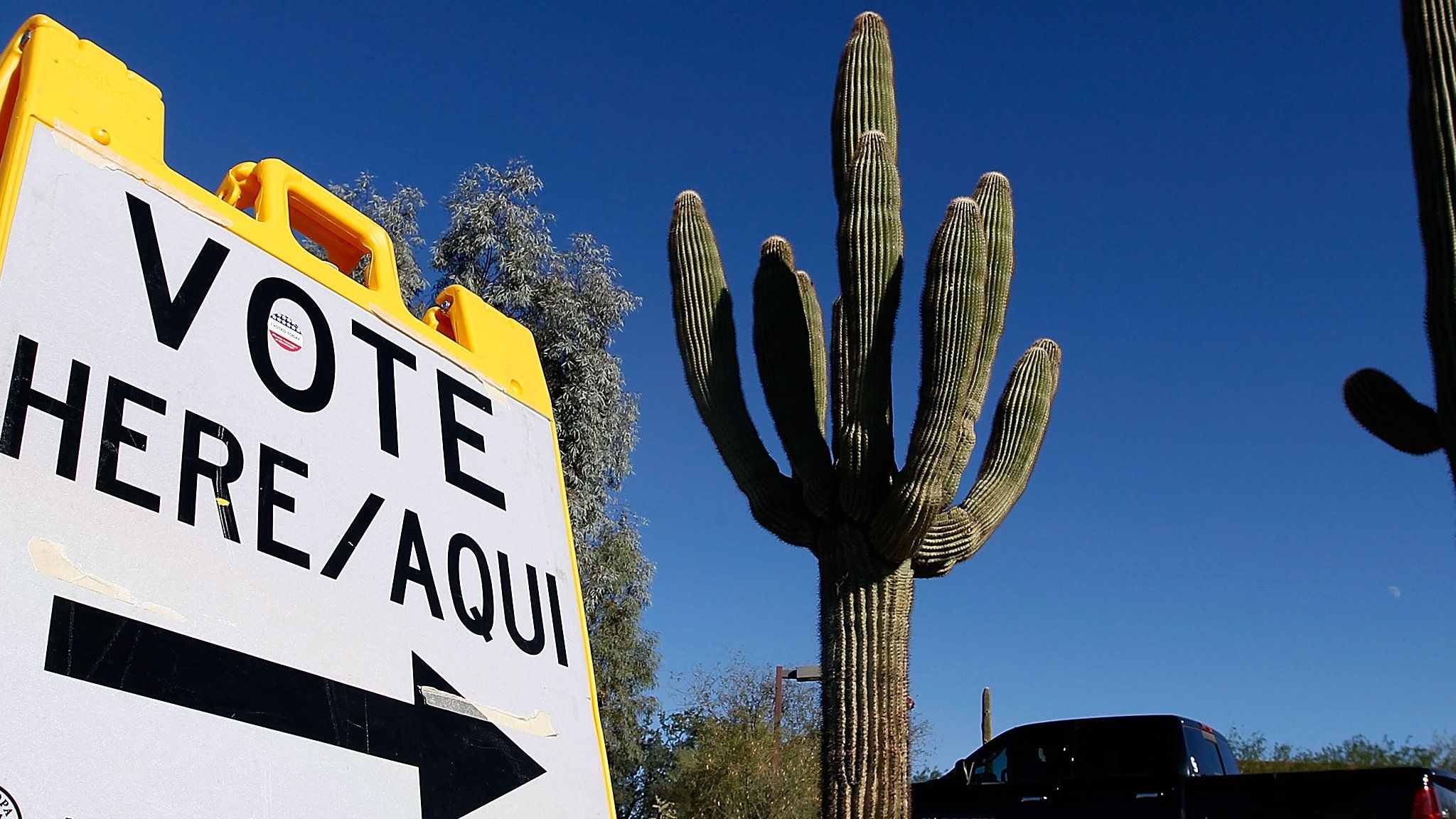 A sign directs voters to a polling station in Cave Creek, Arizona, on 8 November 2016
