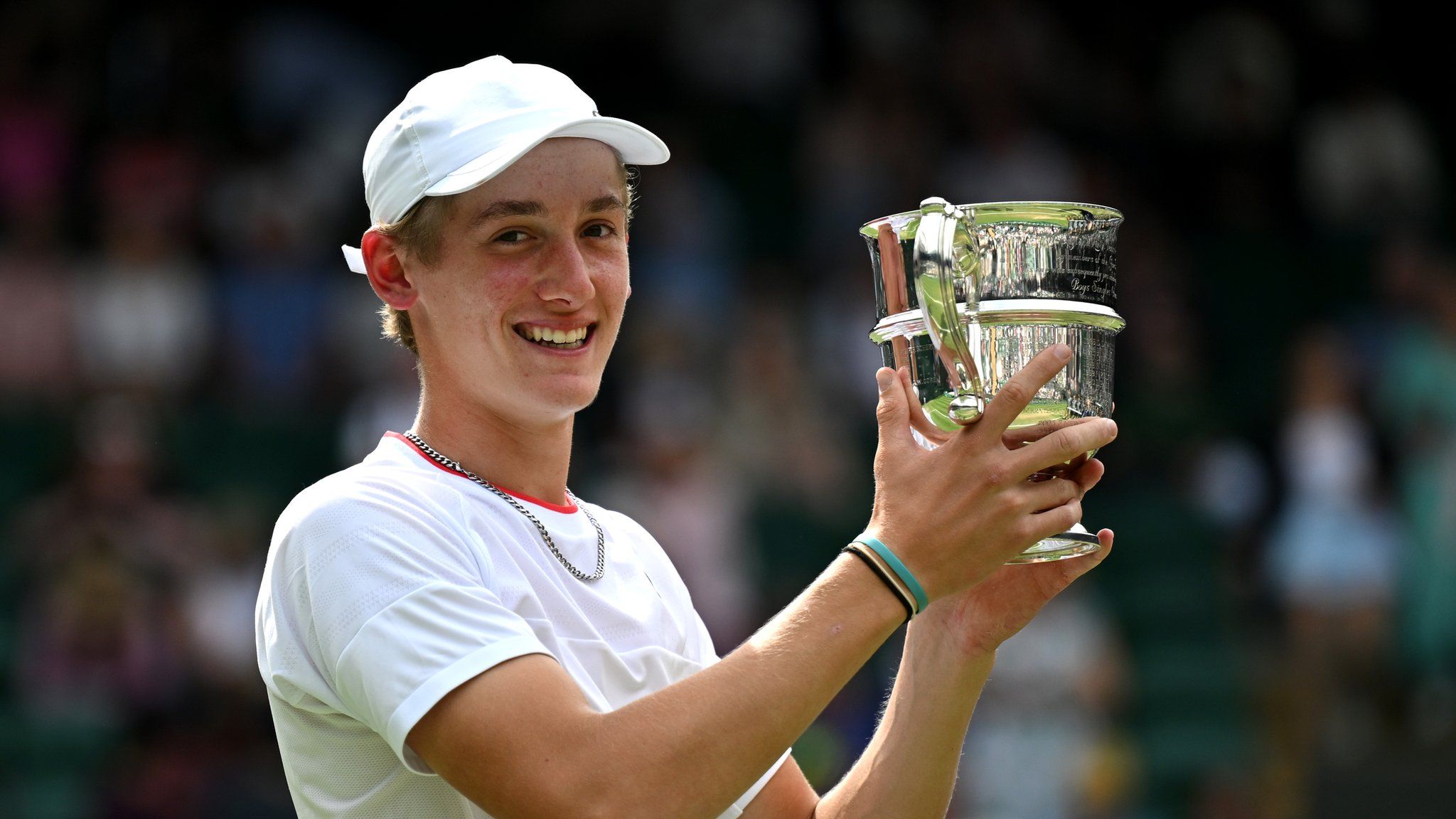 Henry Searle with Wimbledon trophy
