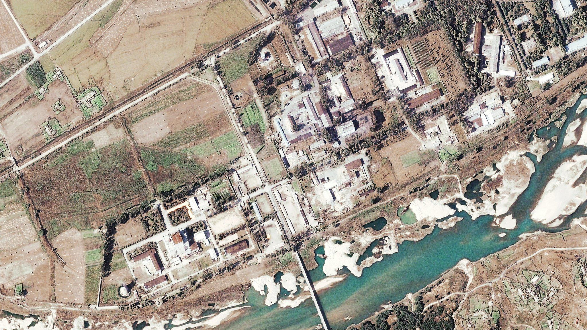 File photo: Satellite image of a five-megawatt nuclear reactor (centre left) in Yongbyon in North Korea, 7 November 2004