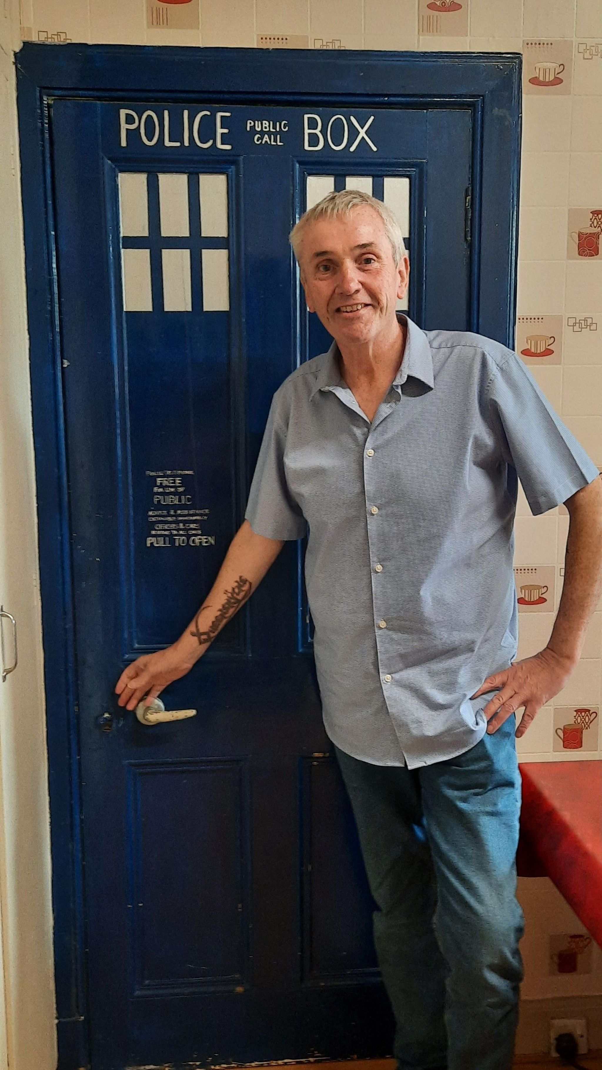 David at the door to a TARDIS