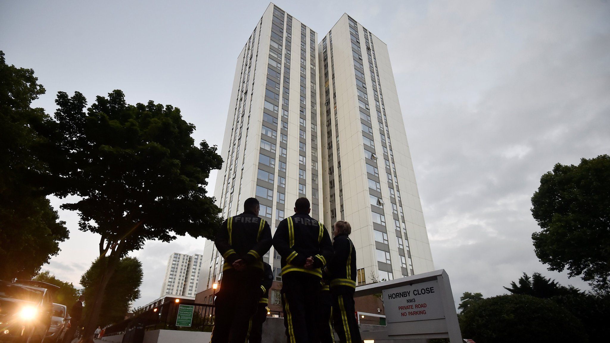 Firefighters outside a tower block