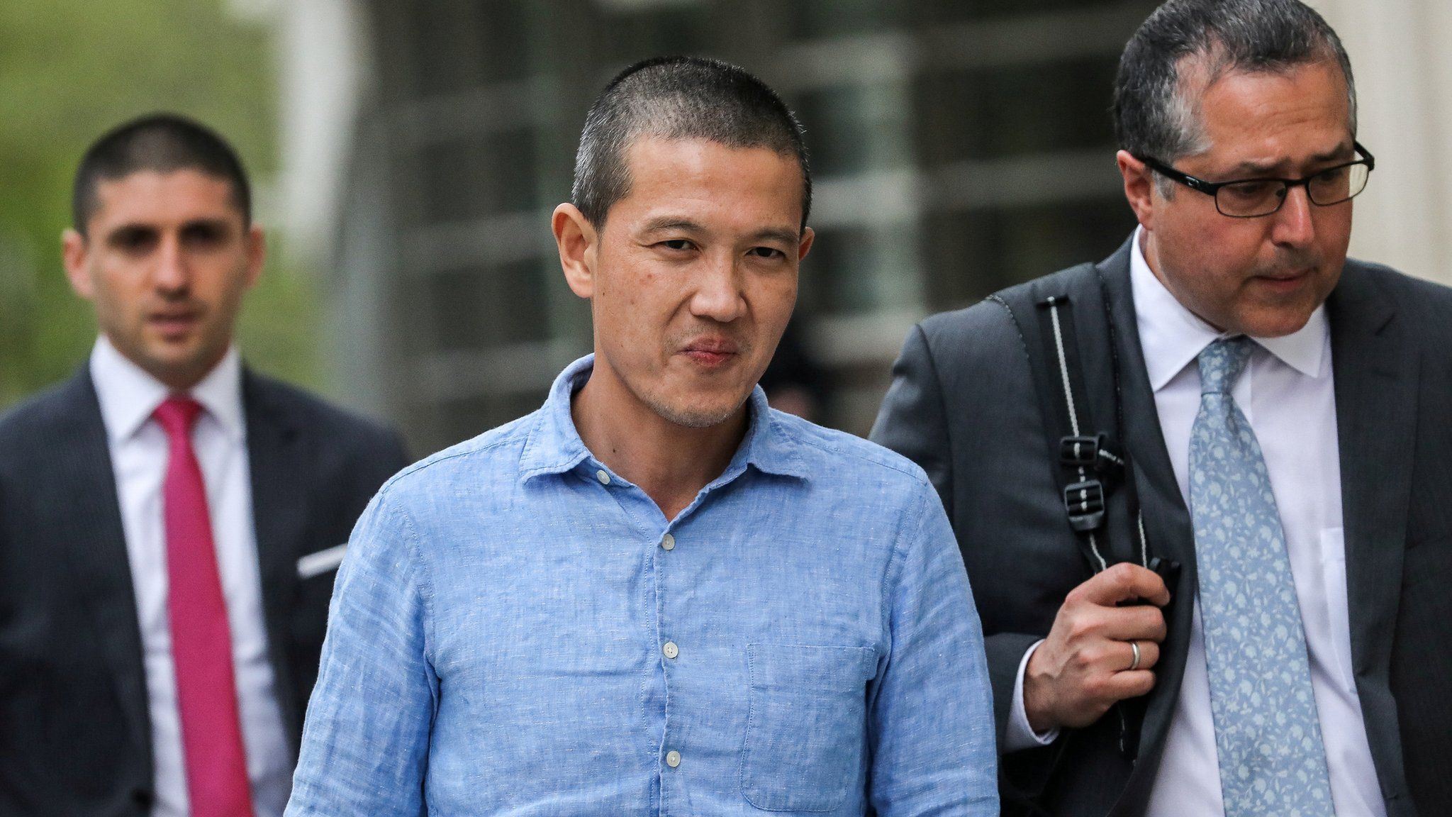 Ex-Goldman Sachs banker Roger Ng and his lawyer Marc Agnifilo leave the federal court in New York, U.S., May 6, 2019.