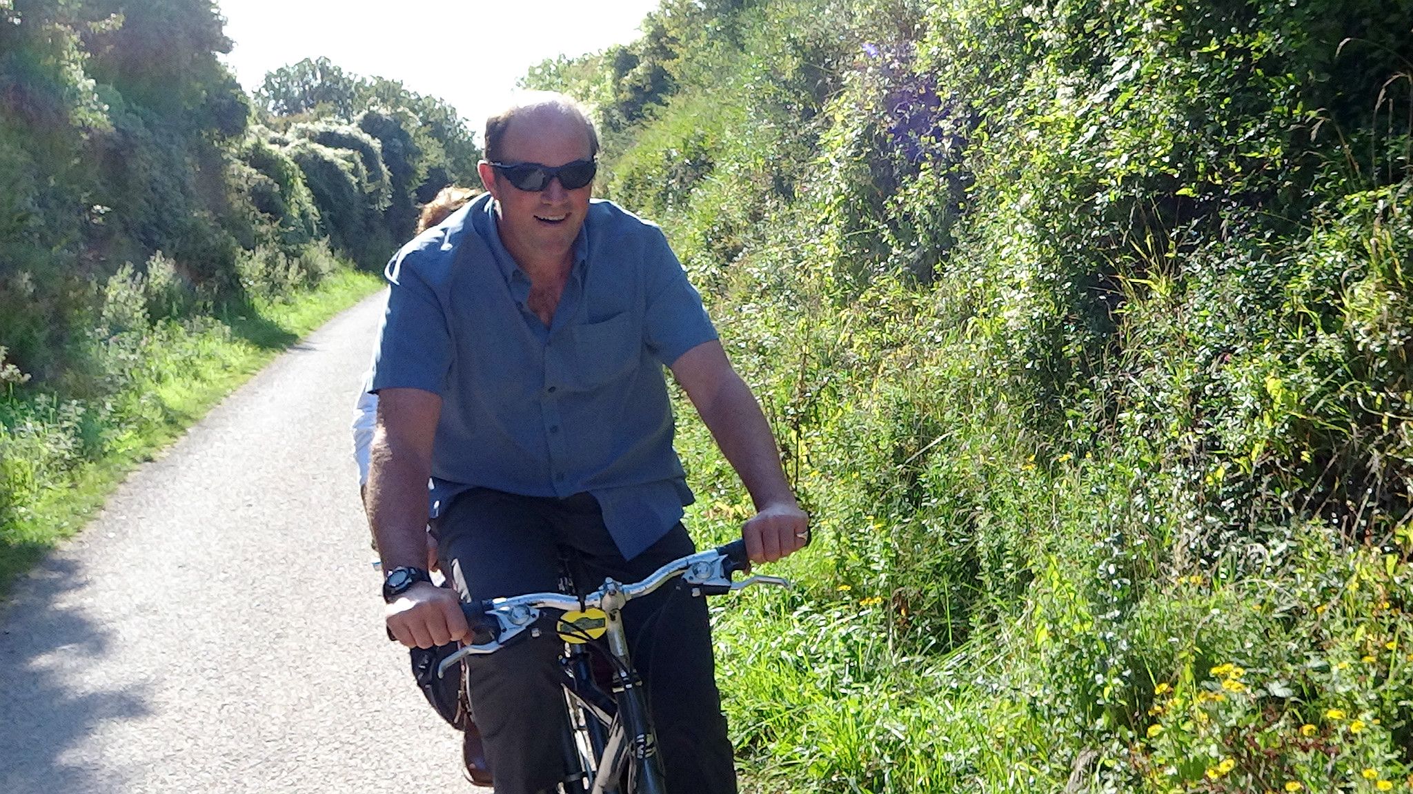 Nigel Maycock on a tandem with his wife