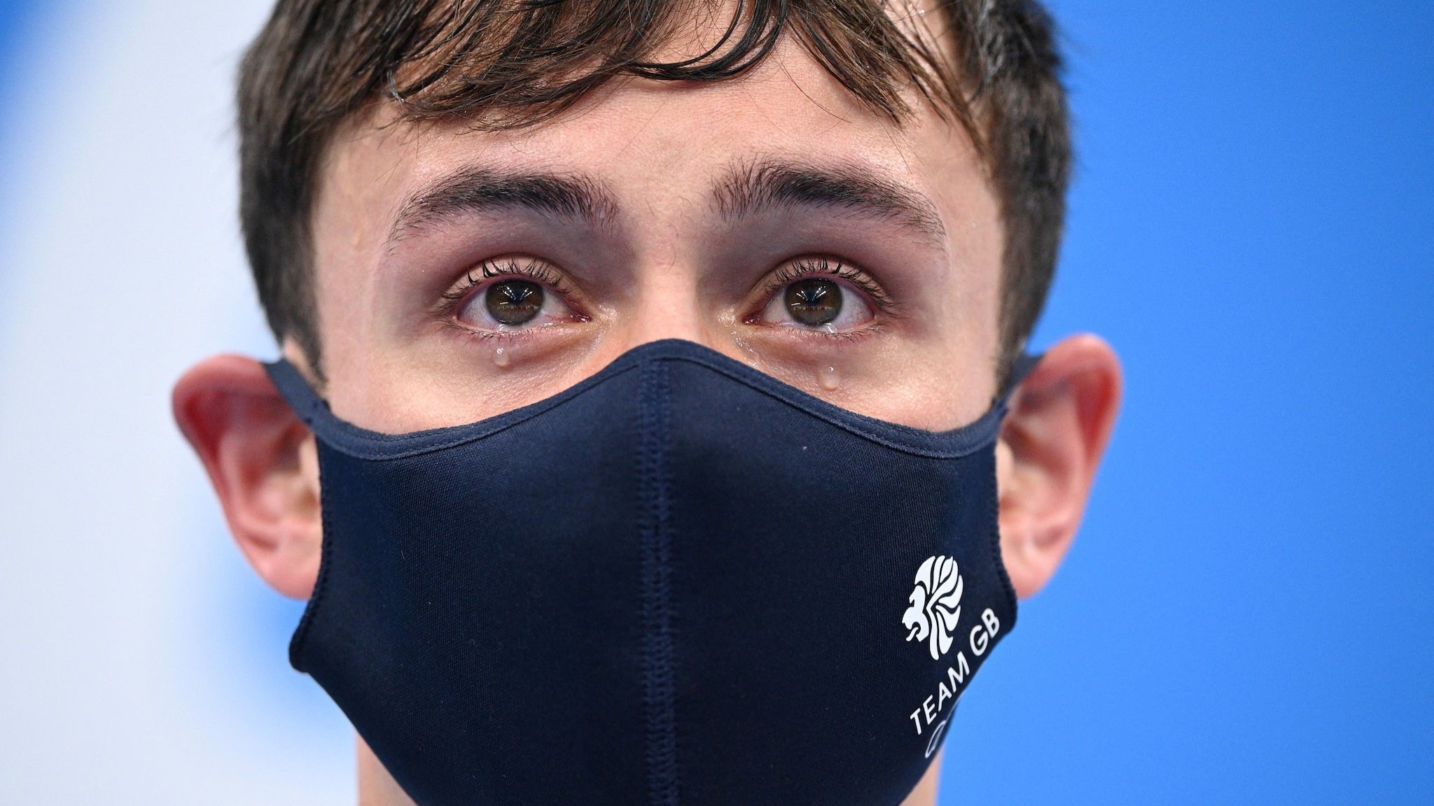 Tom Daley in tears on the podium