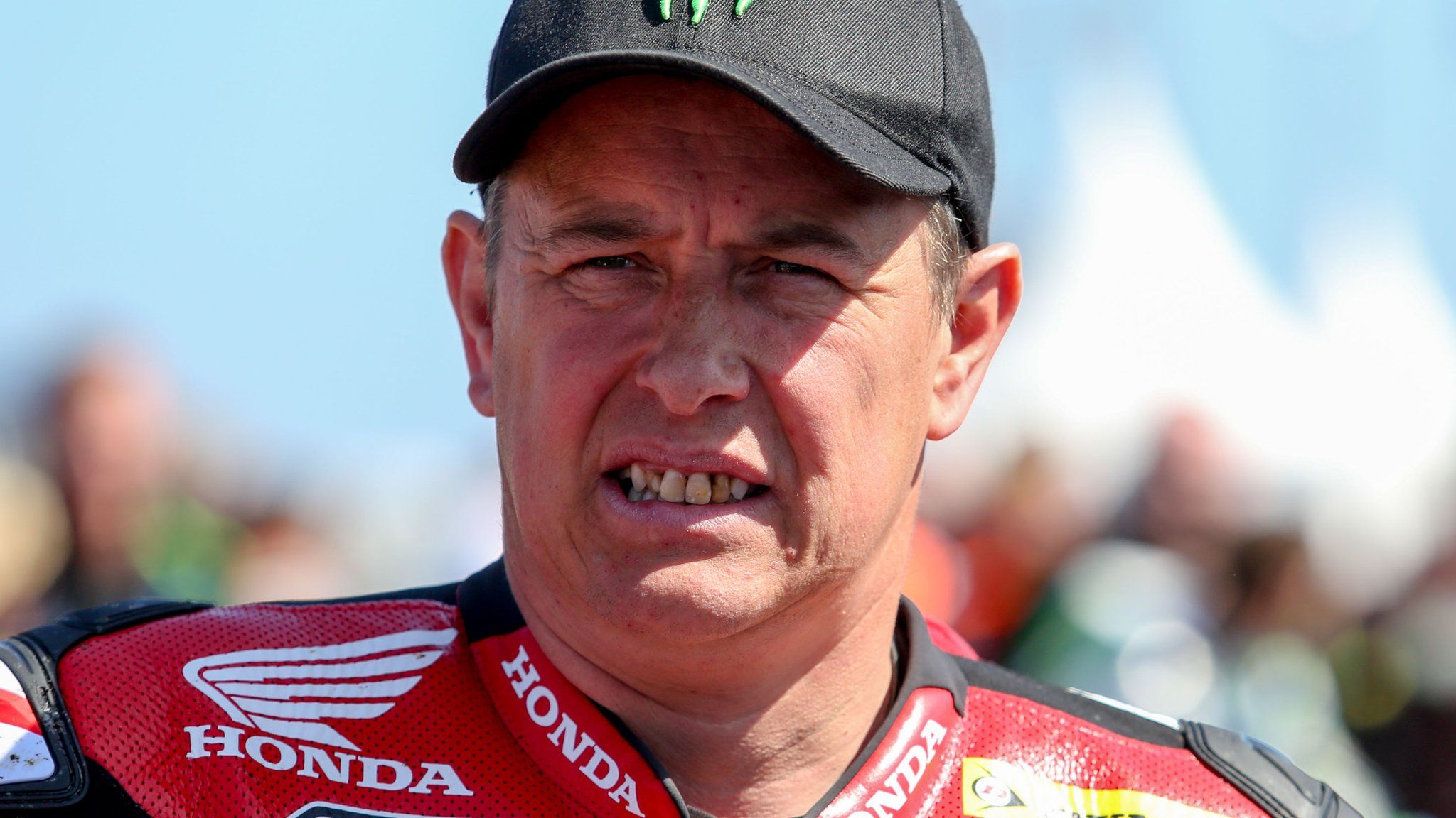 John McGuinness crashed in Thursday's practice session at the North West 200