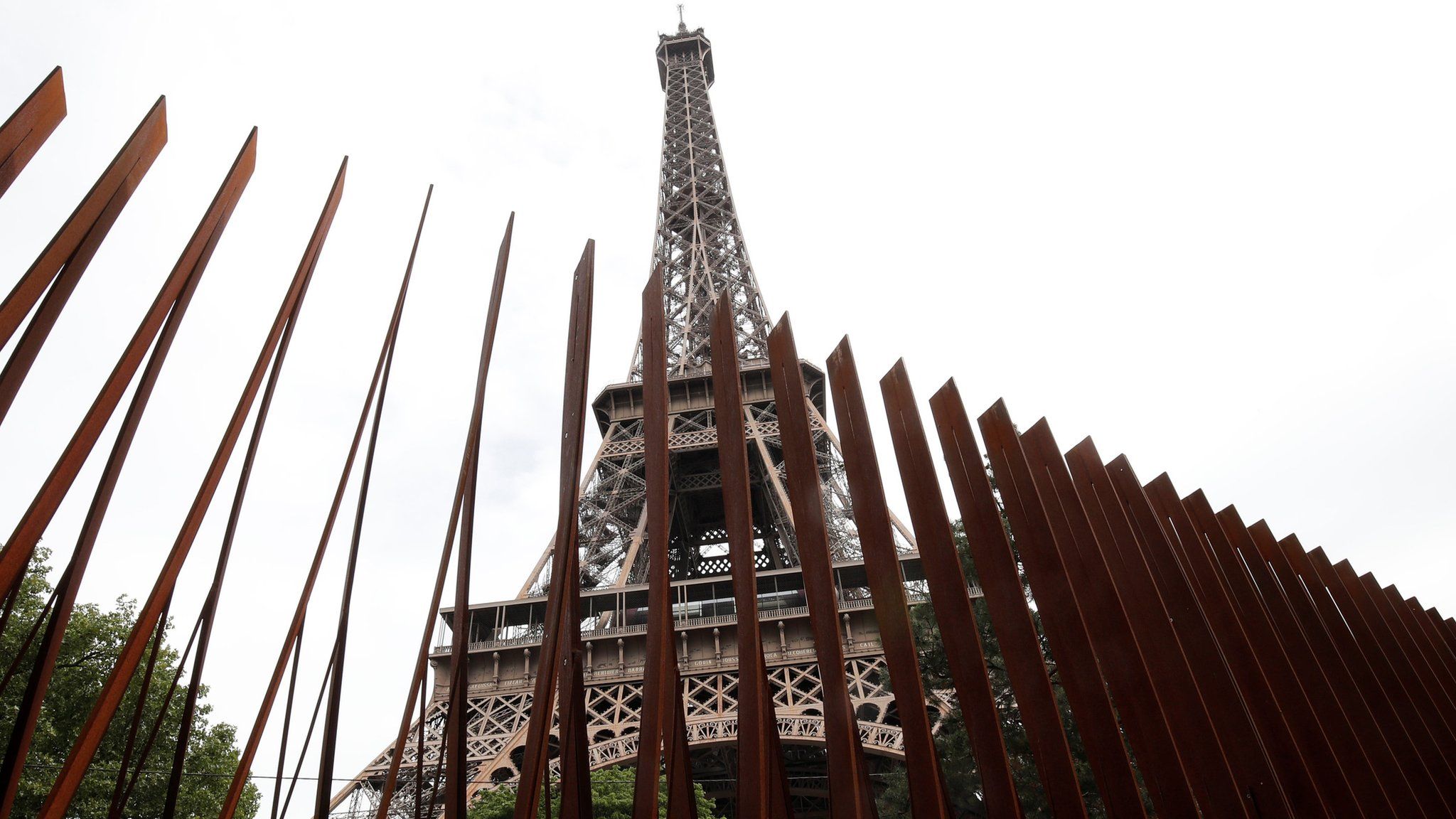 A security steel fence is pictured around the Eiffel Tower in Paris, France, June 14, 2018
