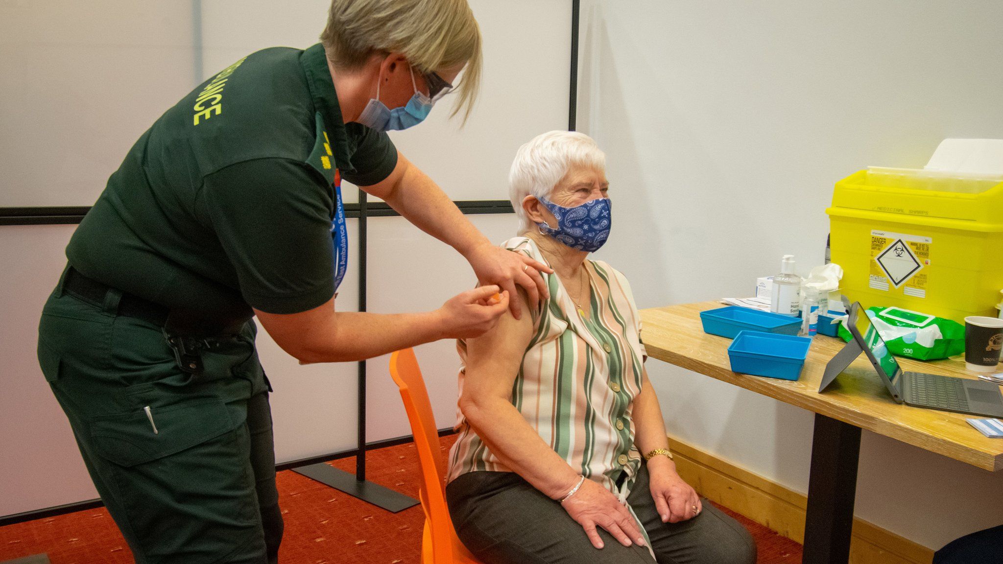 Elderly woman receives Covid vaccine