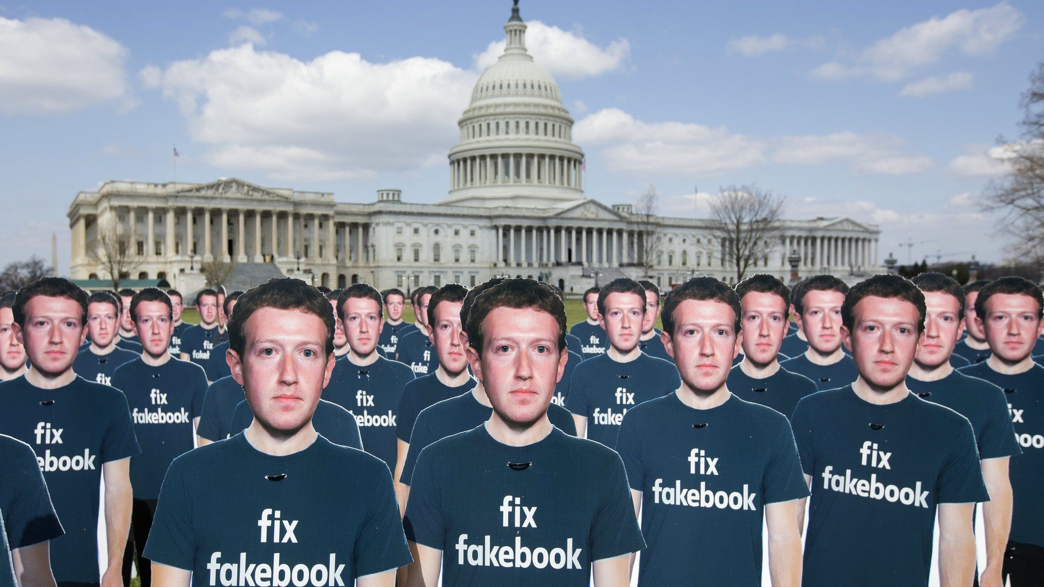 Cardboard cut-outs of Mark Zuckerberg outside the US Capitol