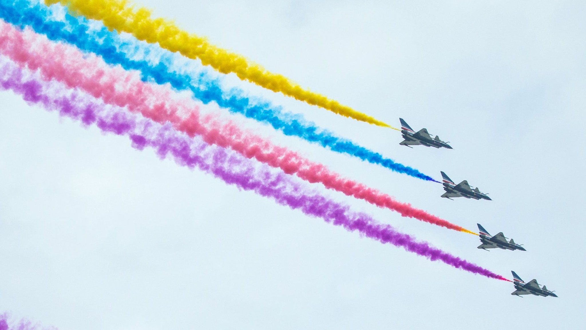 Aircraft perform during a rehearsal for a military parade in Beijing August 23, 2015