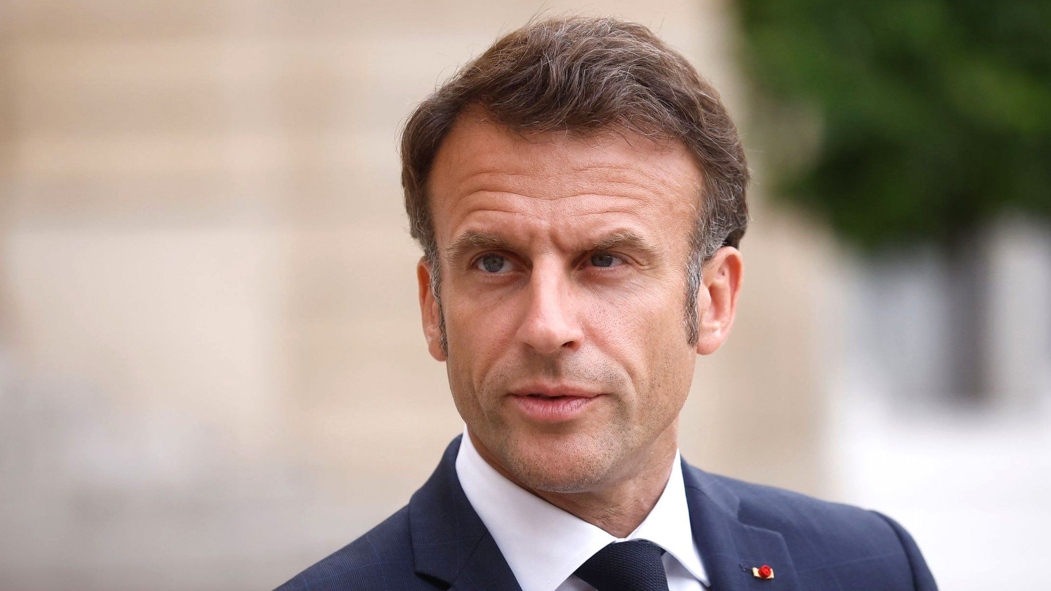 Emmanuel Macron pictured before a meeting with Nato chief Jens Stoltenberg on 28 June