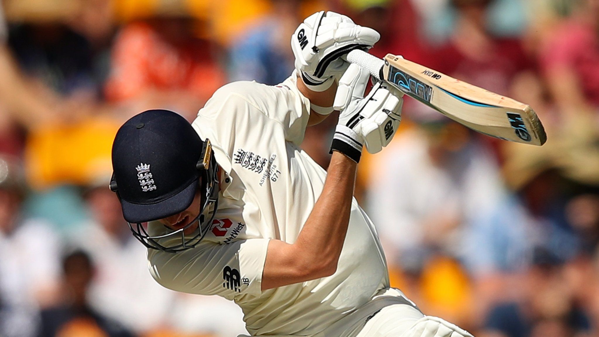 England's Jake Ball attempts to avoid a bouncer in the first Test