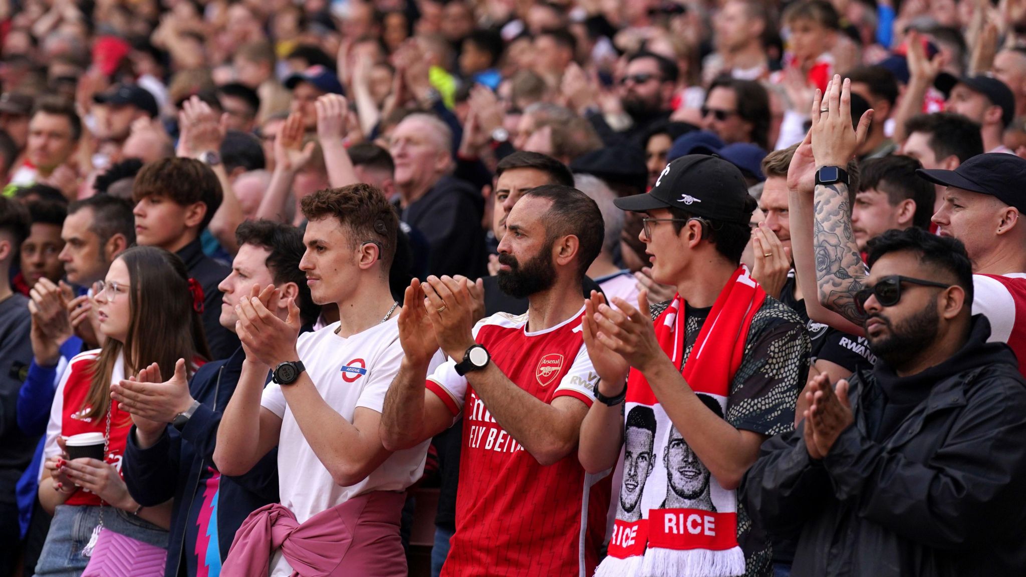 Fans applaud in memory of Daniel Anjorin at Arsenal's game against Bournemouth