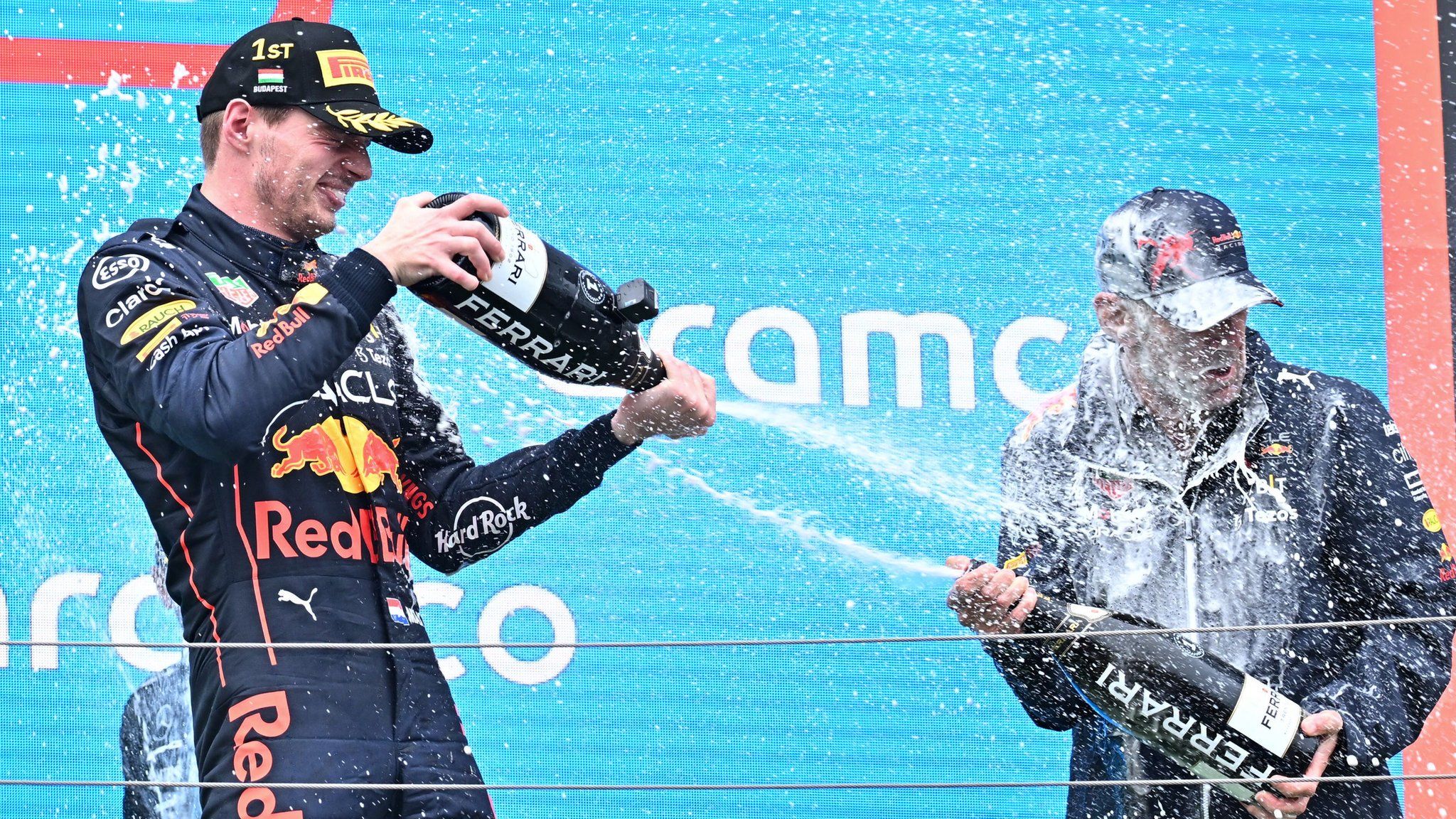 Red Bull's Max Verstappen and Adrian Newey celebrate victory at the Hungarian Grand Prix