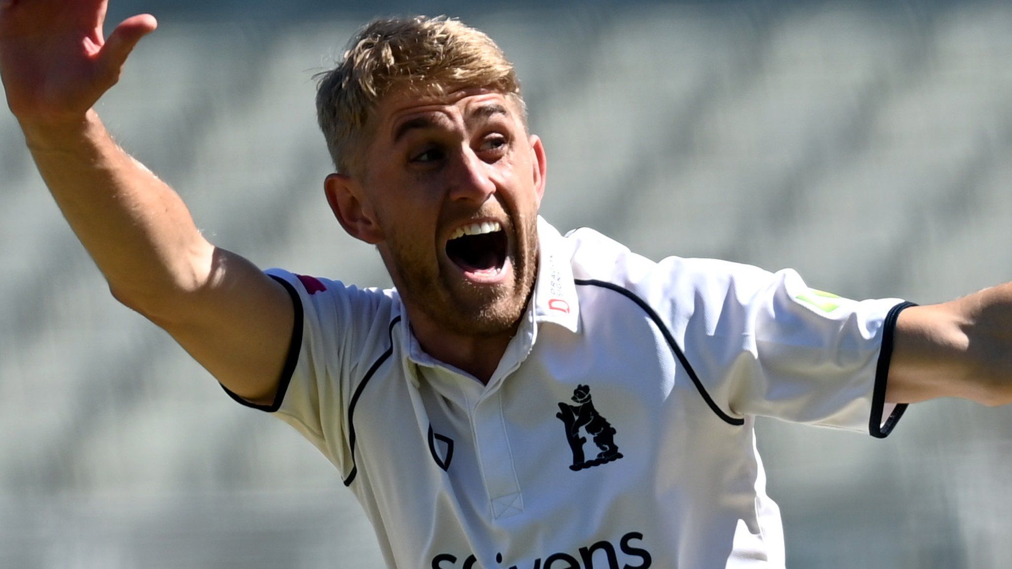 Olly Stone takes a wicket for Warwickshire against Essex