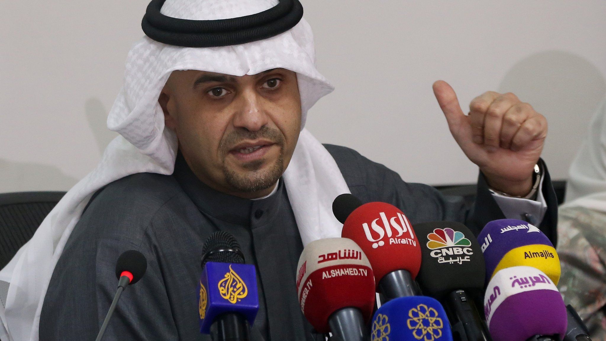 Kuwaiti Acting Finance Minister Anas al-Saleh speaks during a press conference about a financial and economic reform plan prepared by the cabinets on 14 March 2016 in Kuwait City