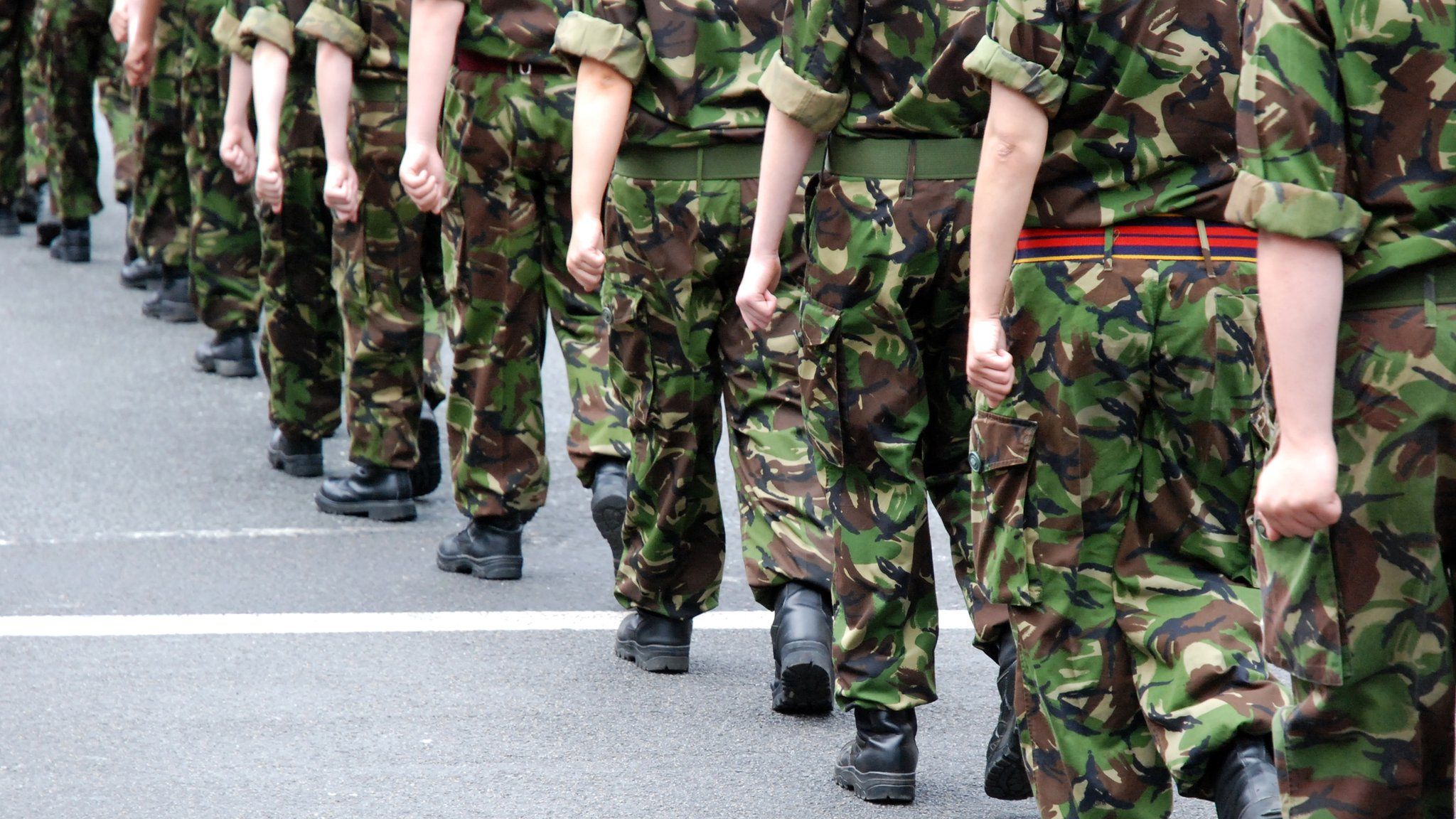 Soldiers marching - stock photo