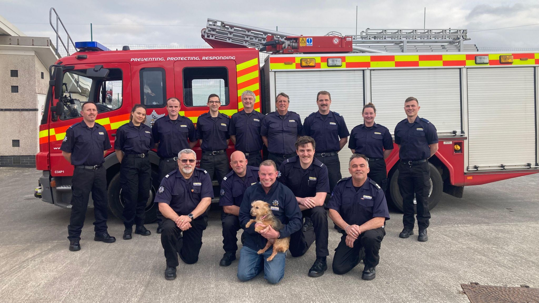 Dog and fire crew