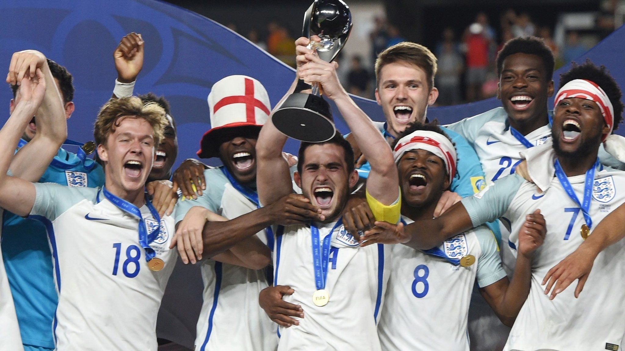 England Under-20s celebrate by lifting the trophy