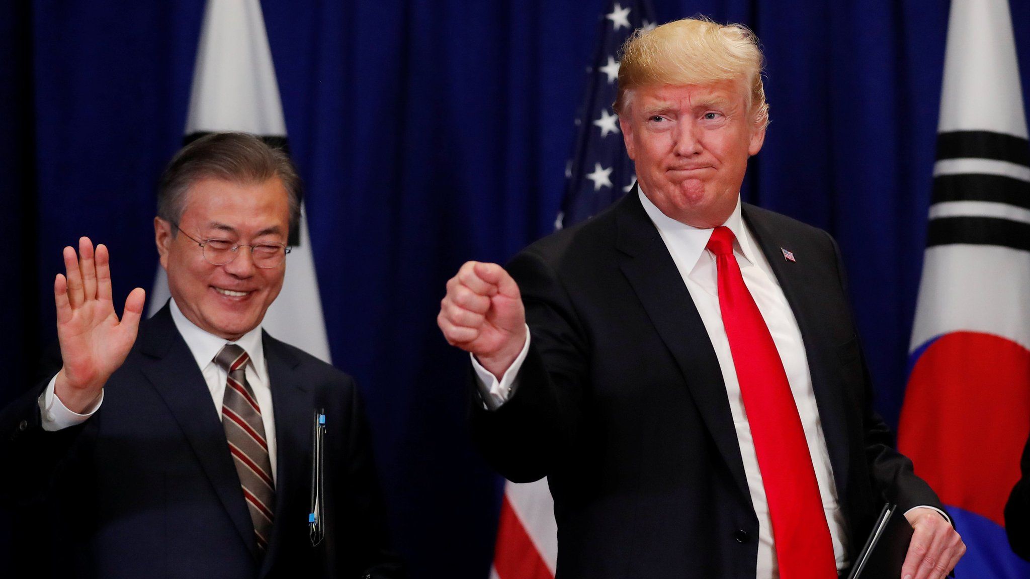 U.S. President Donald Trump and South Korean President Moon Jae-in gesture after signing the U.S.-Korea Free Trade Agreement on during a ceremony on the sidelines of the 73rd United Nations General Assembly in New York, U.S., September 24, 2018.