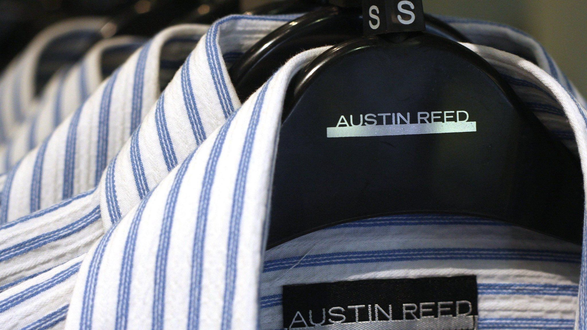 Austin Reed shirts on a rack