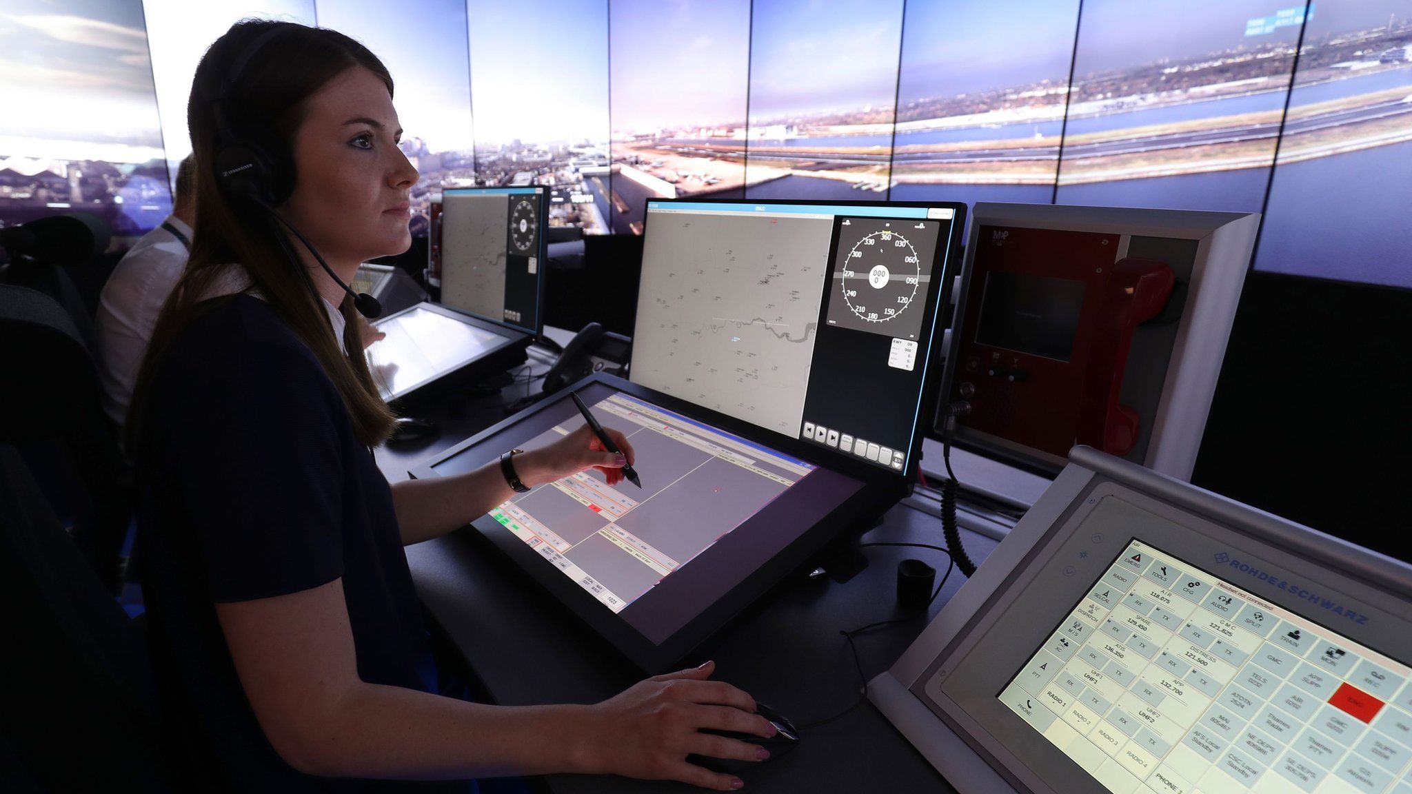 Nats personnel give a demonstration in the operations room, which will direct aircraft at London City Airport