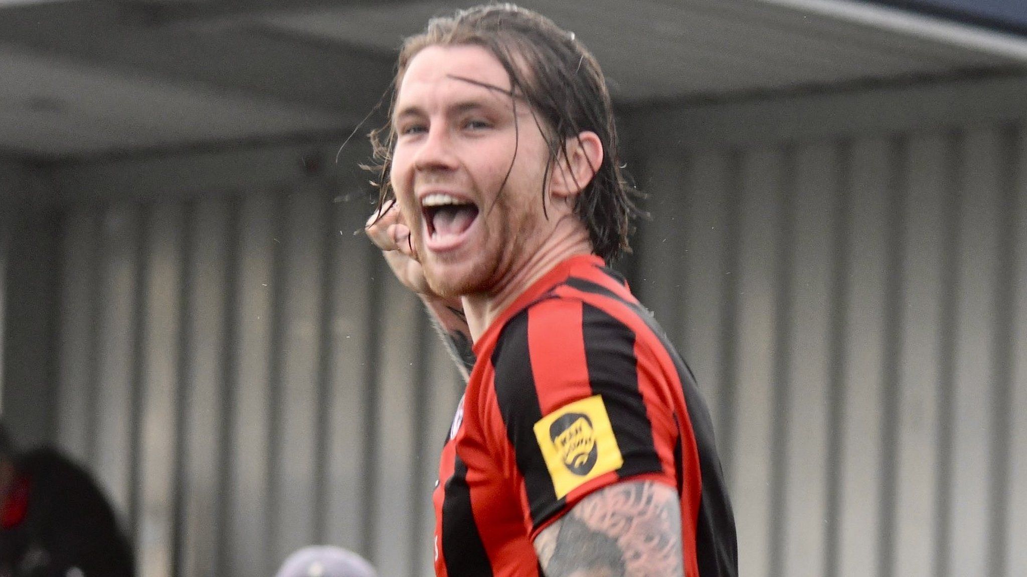 Tyler Harvey celebrates scoring for Truro City