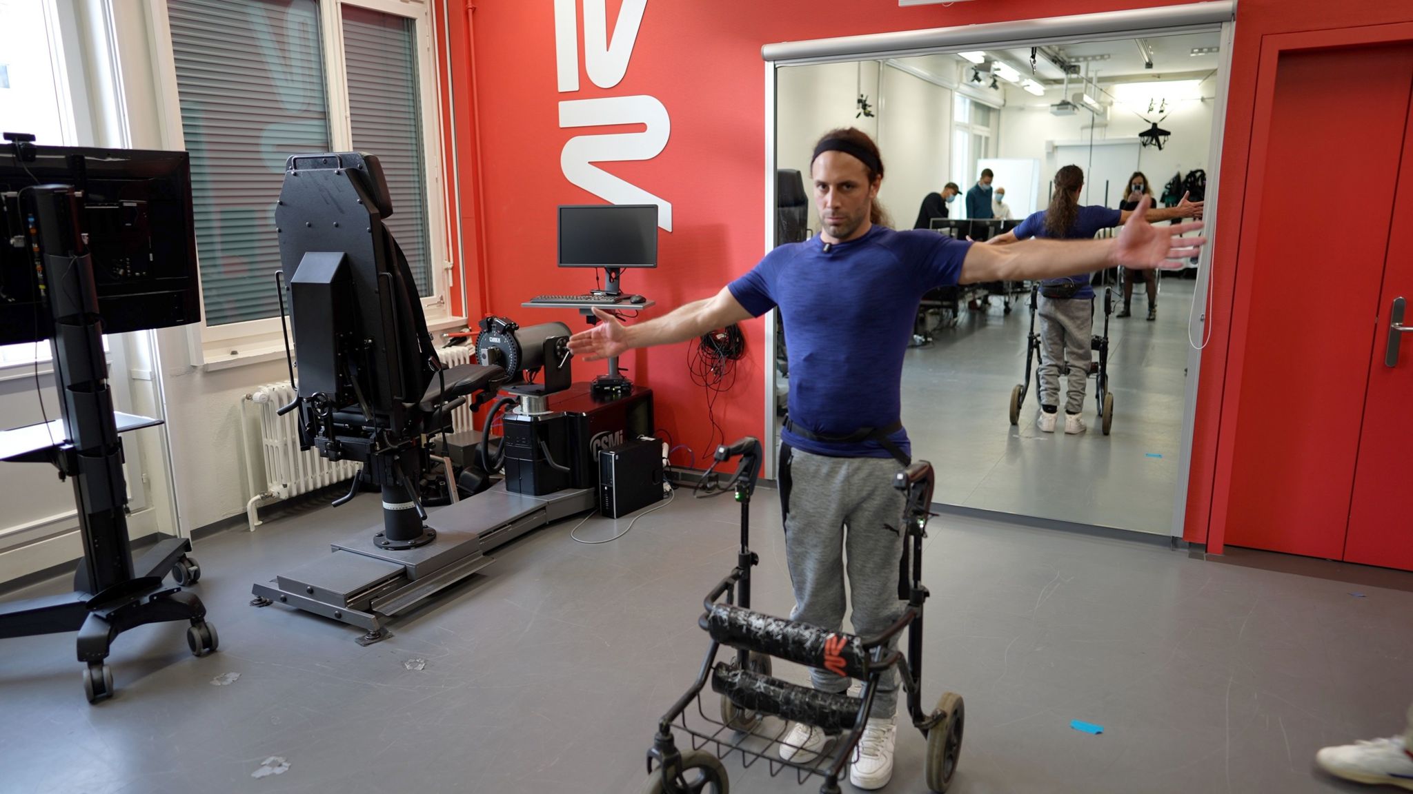 Paralysed patient with walker