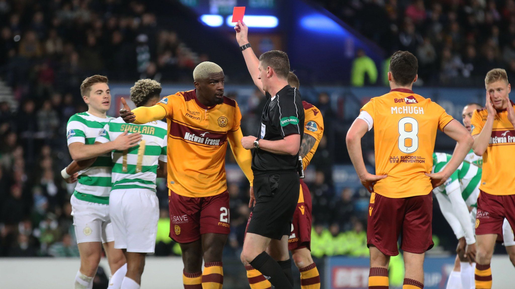 Motherwell's Cedric Kipre receives a red card during the Scottish League Cup final