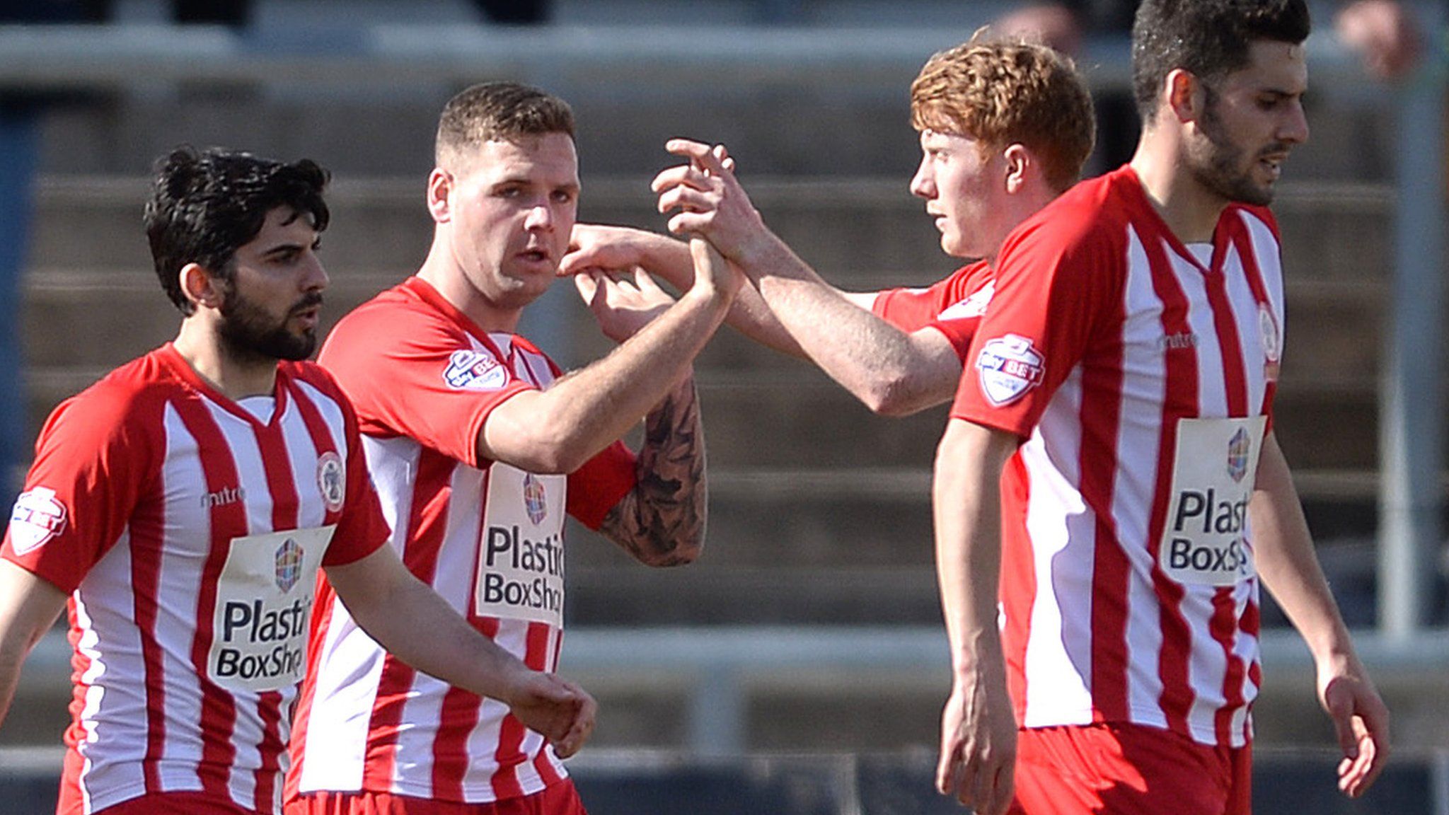Accrington players celebrate after Billy Kee's goal