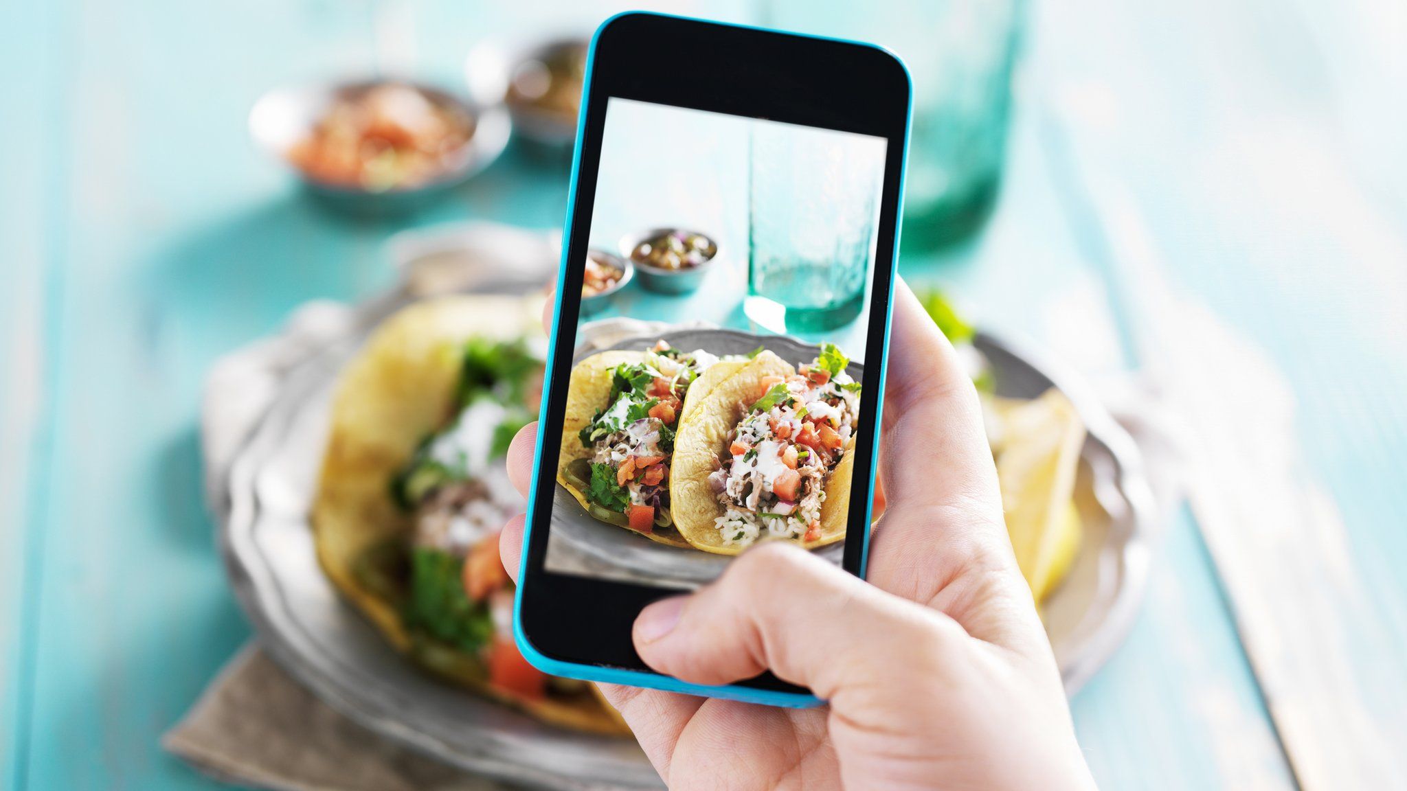 Taking a photo of tacos with a phone