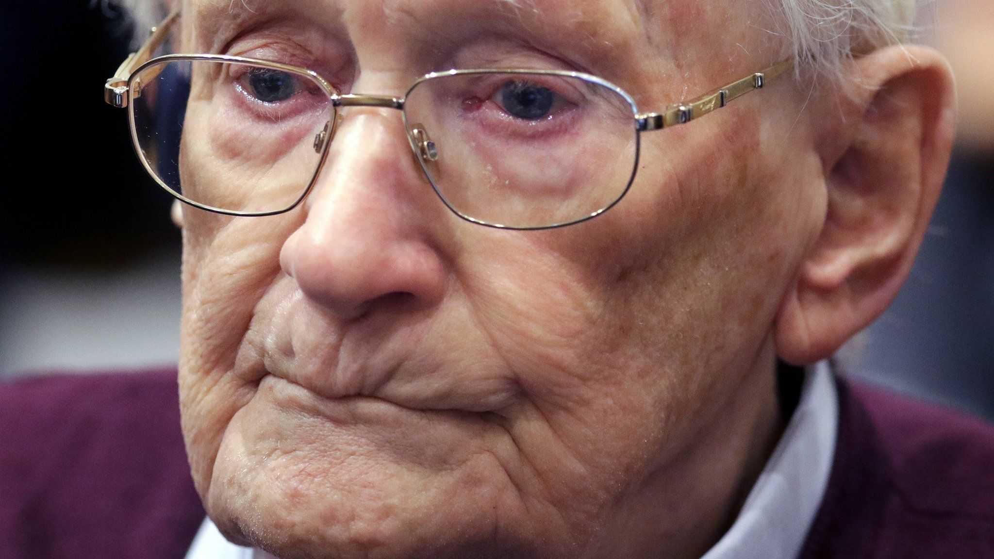 In this 15 July 2015 file photo Oskar Groening listens to the verdict of his trial at a court in Lueneburg, northern Germany