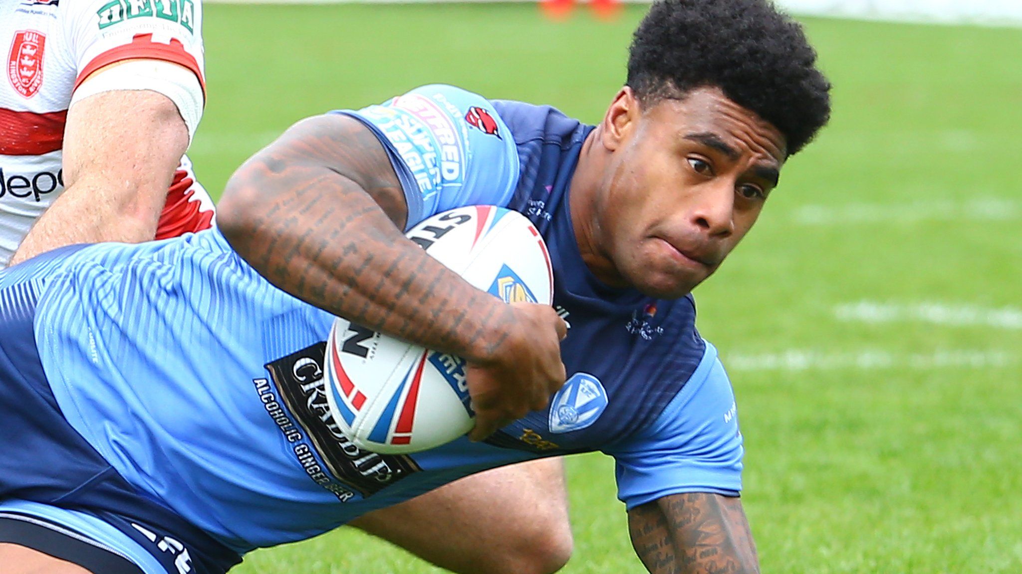 St Helens centre Kevin Naiqama scores a try