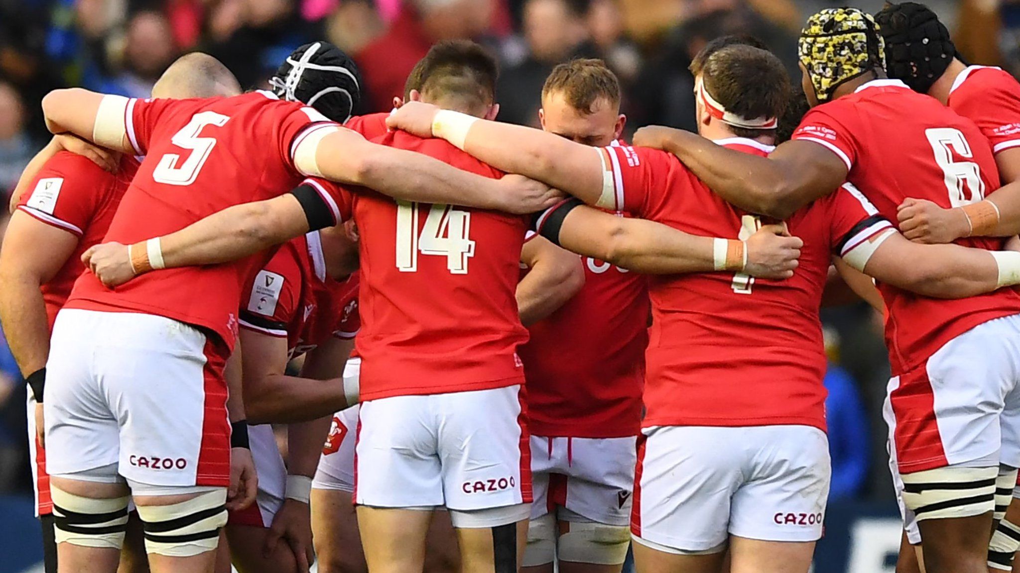 Wales players in a huddle before they take on Scotland in the Six Nations