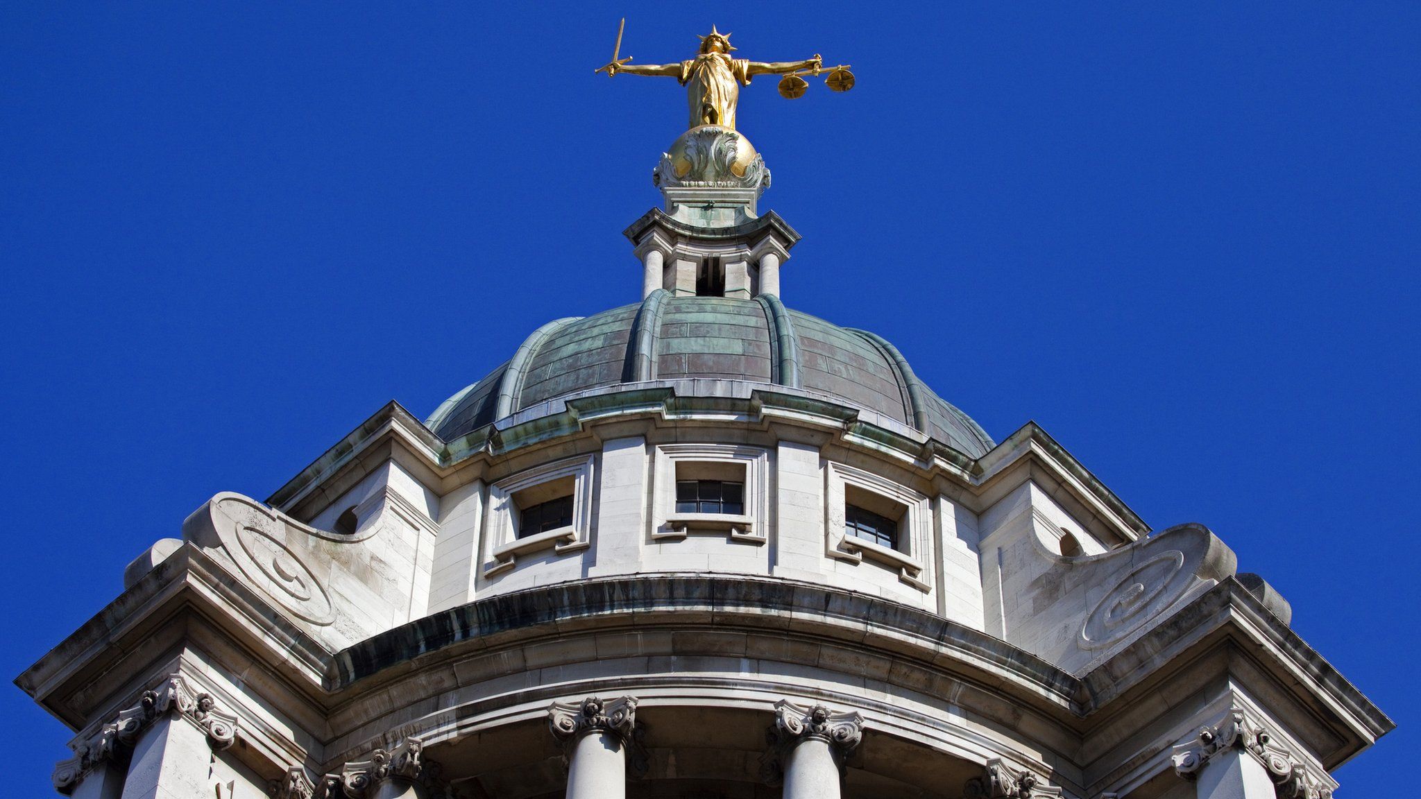 Lady Justice statue on top of the Old Bailey building