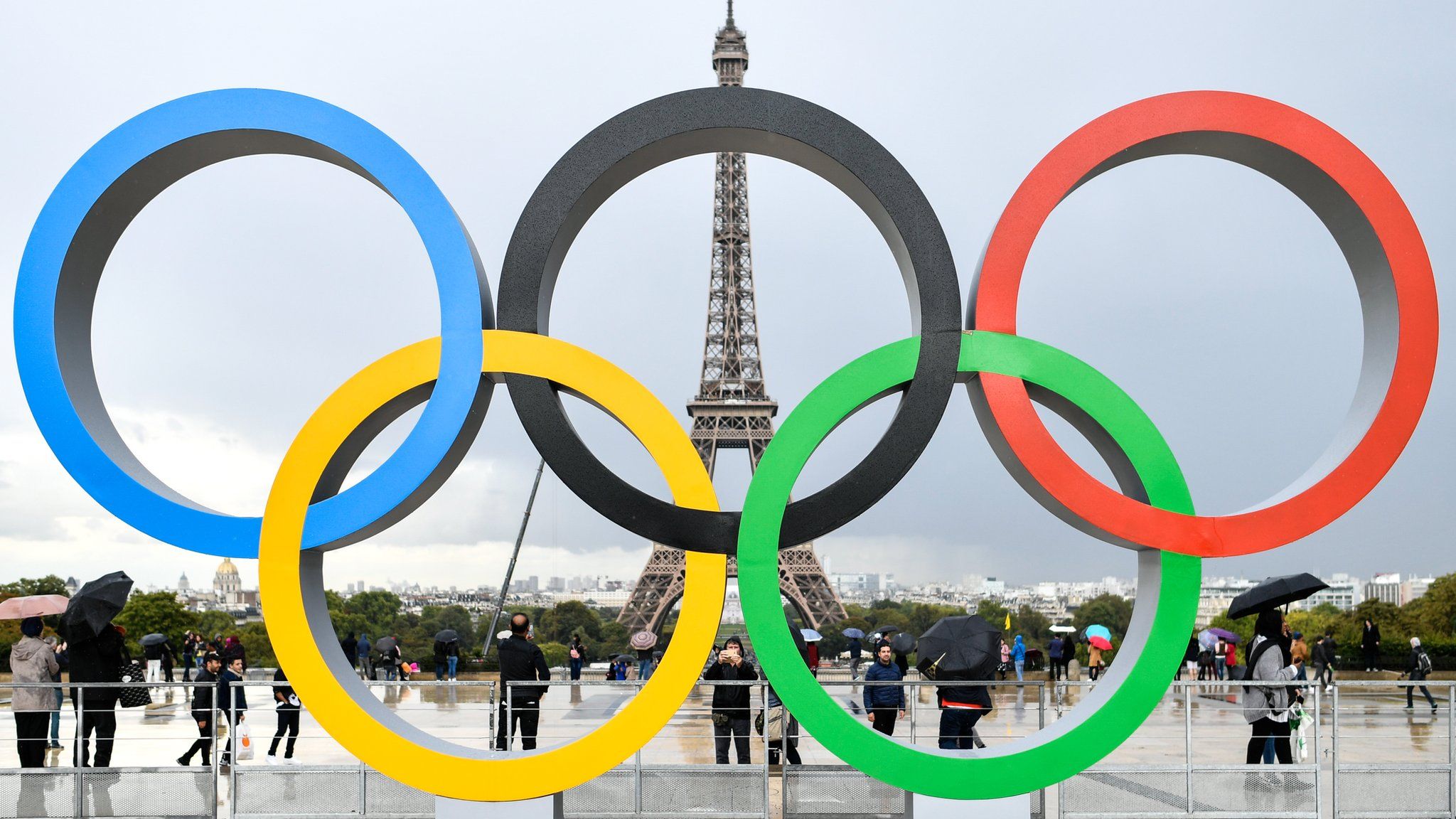 Olympic rings in Paris, with the Eiffel Tower in the background
