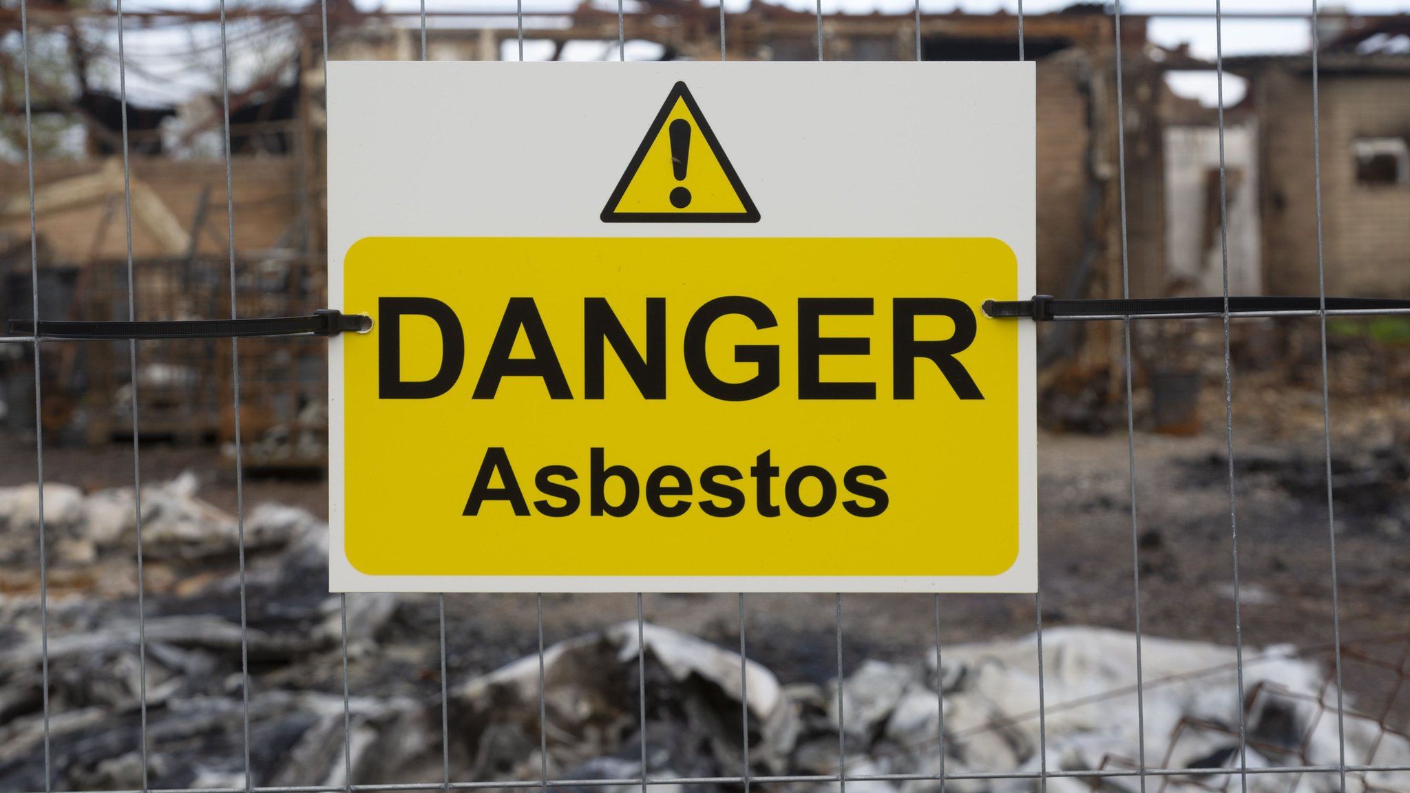 Sign that reads 'DANGER Asbestos'