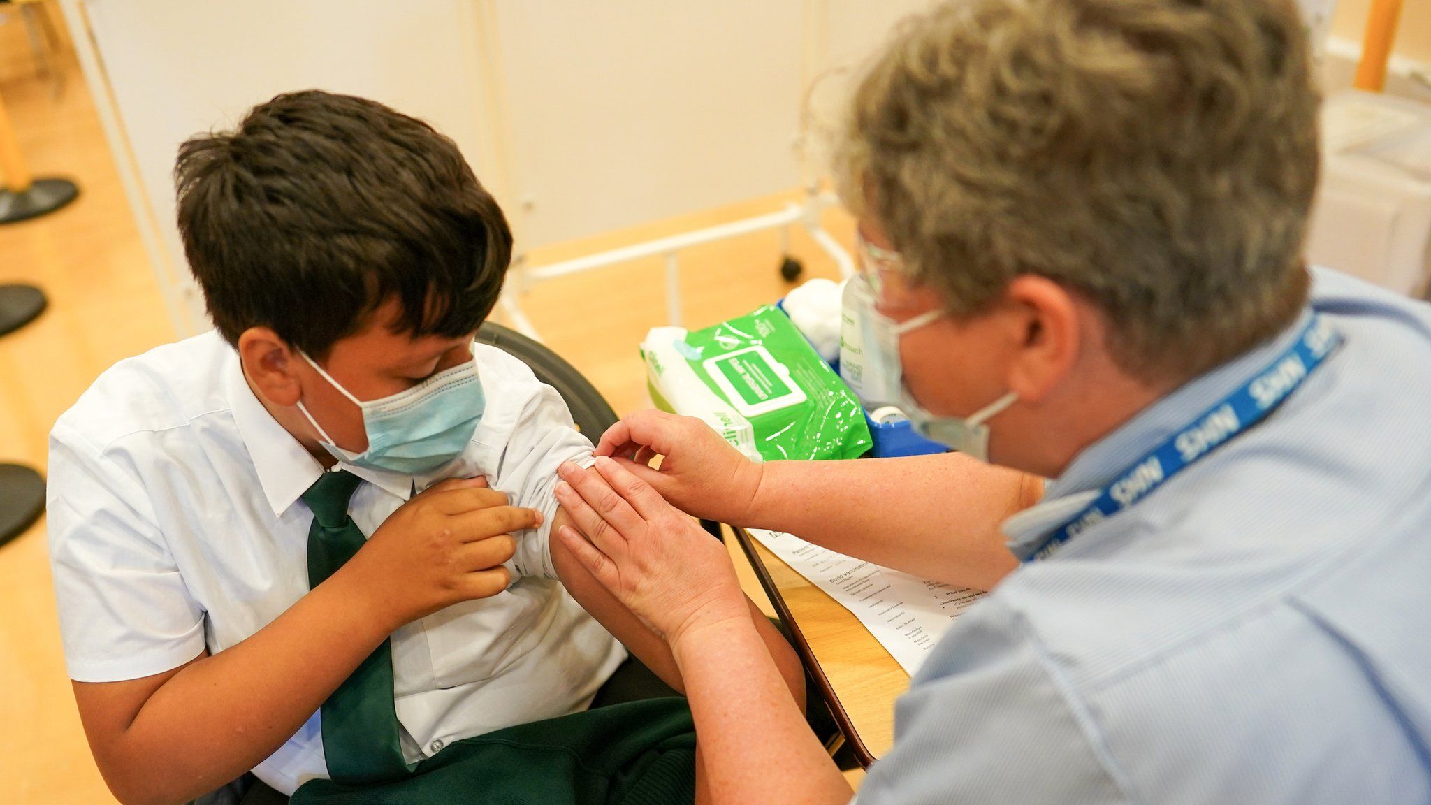 Boy, 13, receives a Covid vaccine