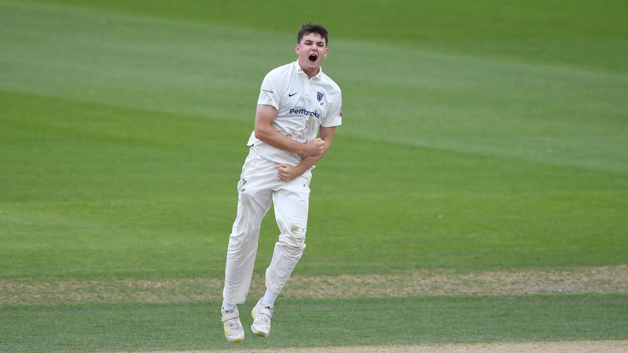 Sussex bowler Jack Carson celebrates a wicket