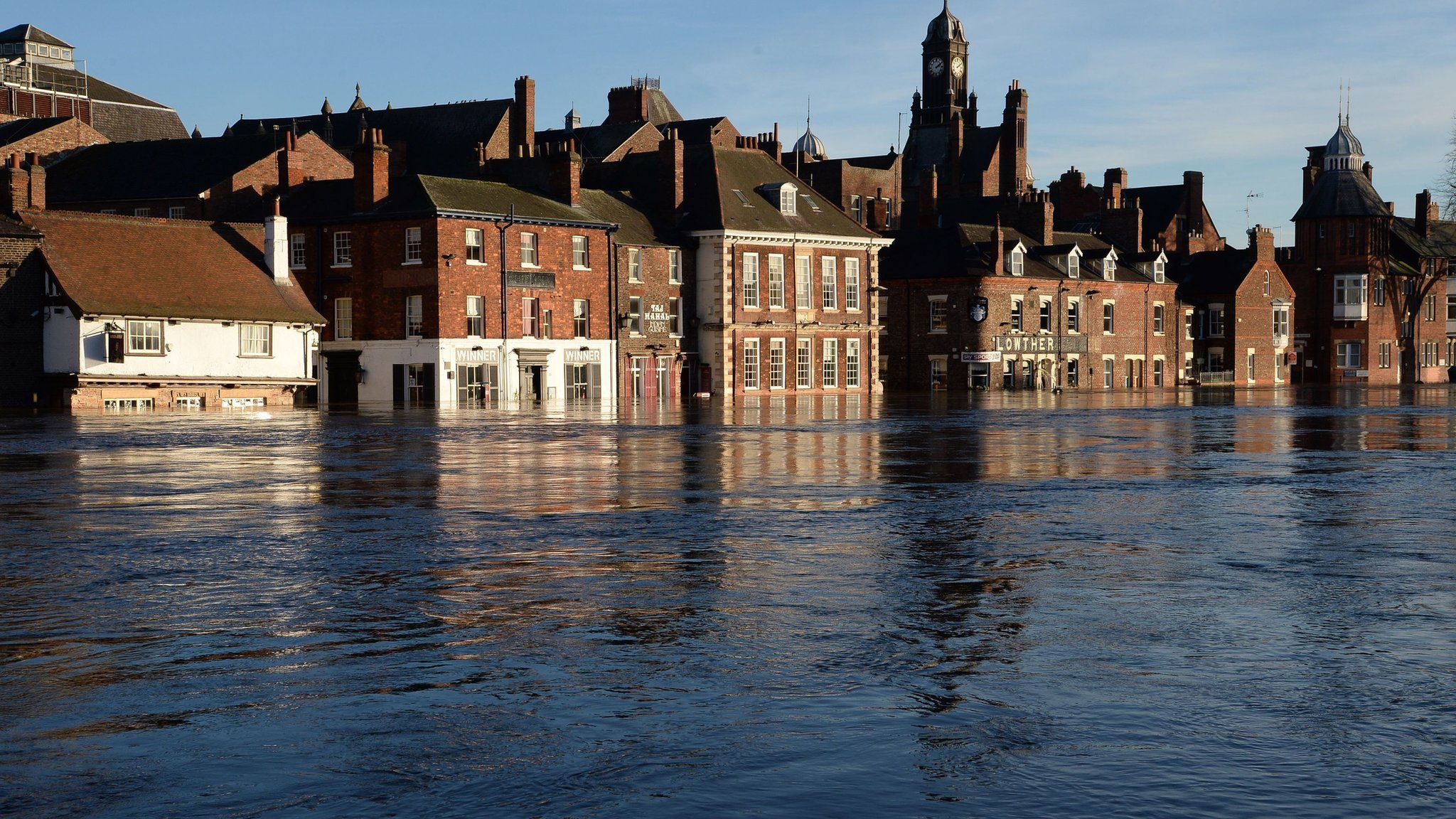 Properties next to the swollen River Ouse in York on 27 December 2015