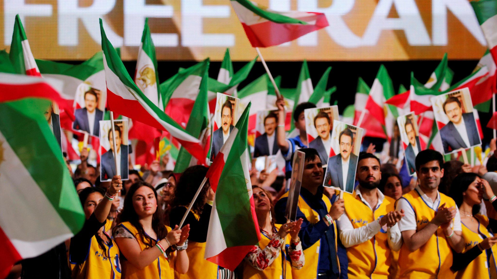 Supporters of the National Council of Resistance of Iran attend a rally in Villepinte, near Paris, France, June 30, 2018